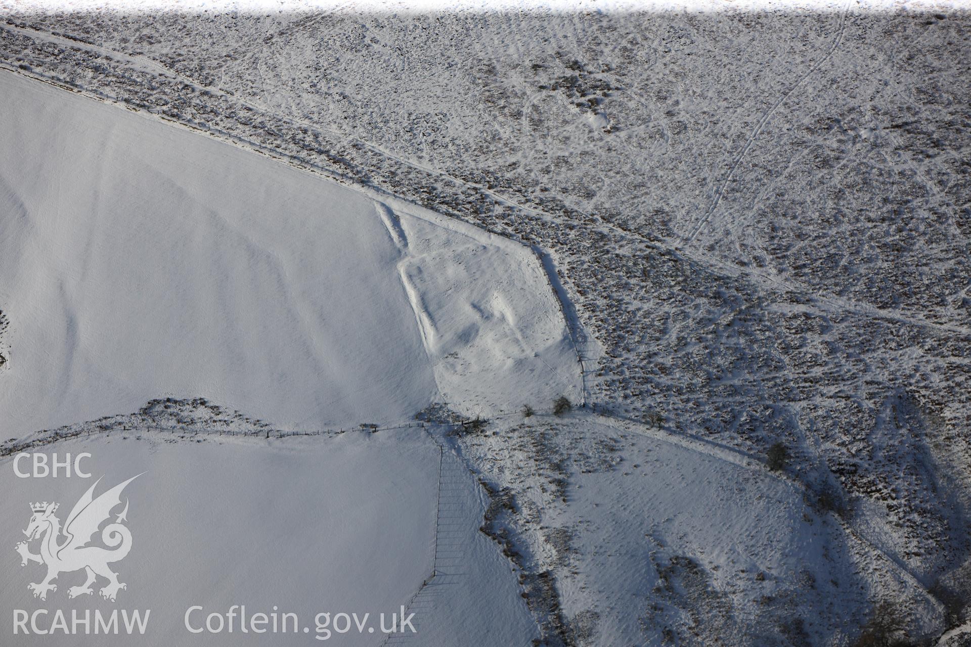 Cwm-Twrch Medieval platform settlement, Glascwm. Oblique aerial photograph taken during the Royal Commission?s programme of archaeological aerial reconnaissance by Toby Driver on 15th January 2013.