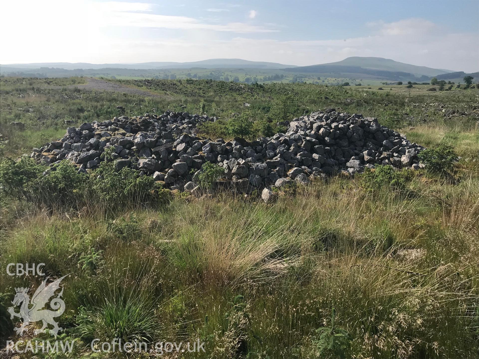 Colour photo showing view of Carn-yr-Arian round barrow, Ystradfellte, taken by Paul R. Davis, 5th June 2018.