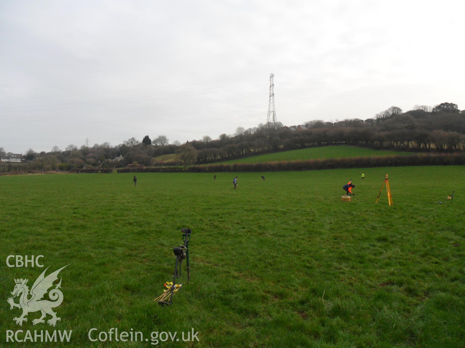 Digital colour photograph of archaeological investigation at Maes Gwenllian battlefield. From report no. 1050 - Maes Gwenllian battlefield, part of the Welsh Battlefield Metal Detector Survey, carried out by Archaeology Wales.