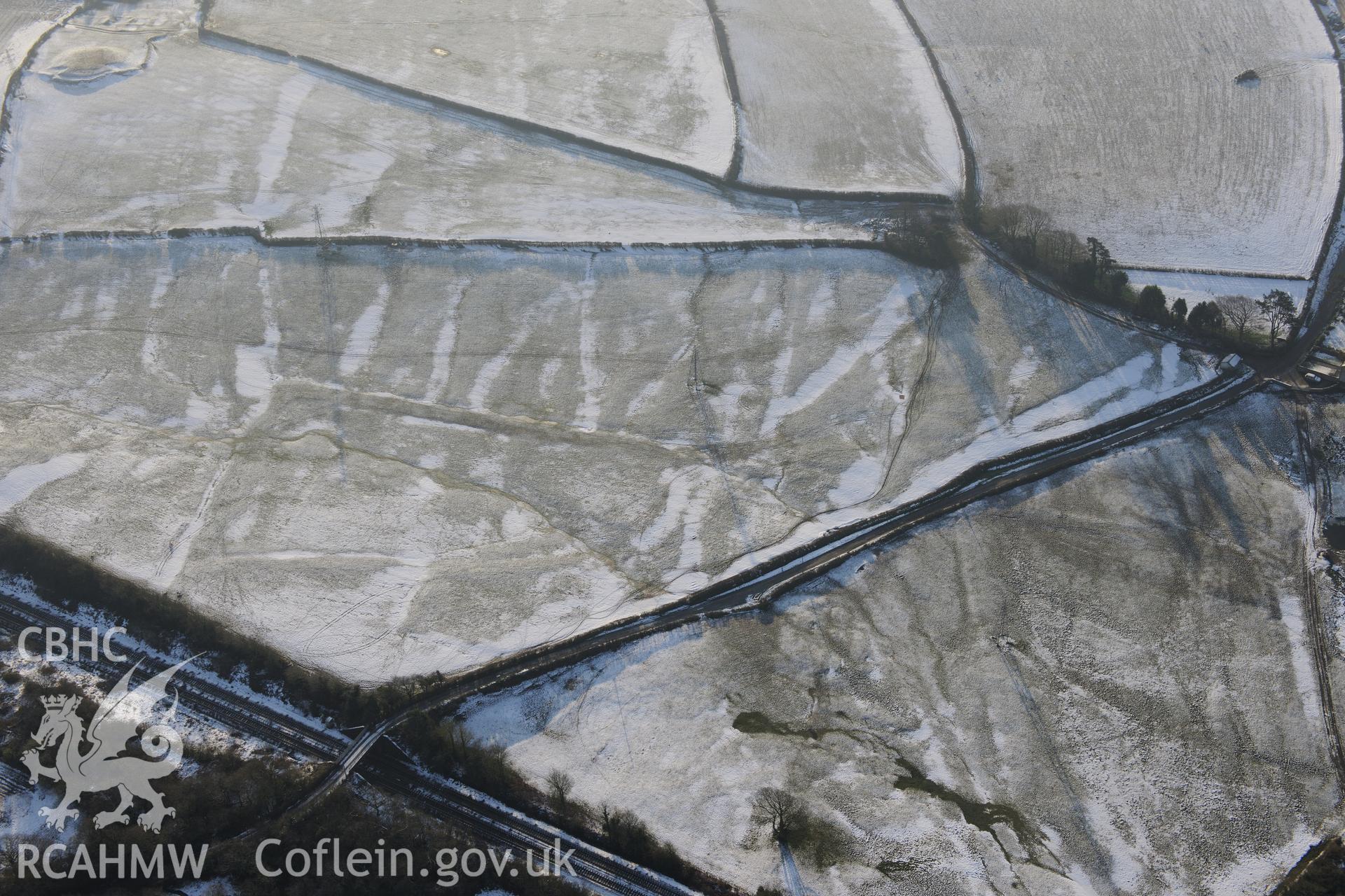 Stormy Grange, south east of Pyle, Bridgend. Oblique aerial photograph taken during the Royal Commission?s programme of archaeological aerial reconnaissance by Toby Driver on 24th January 2013.