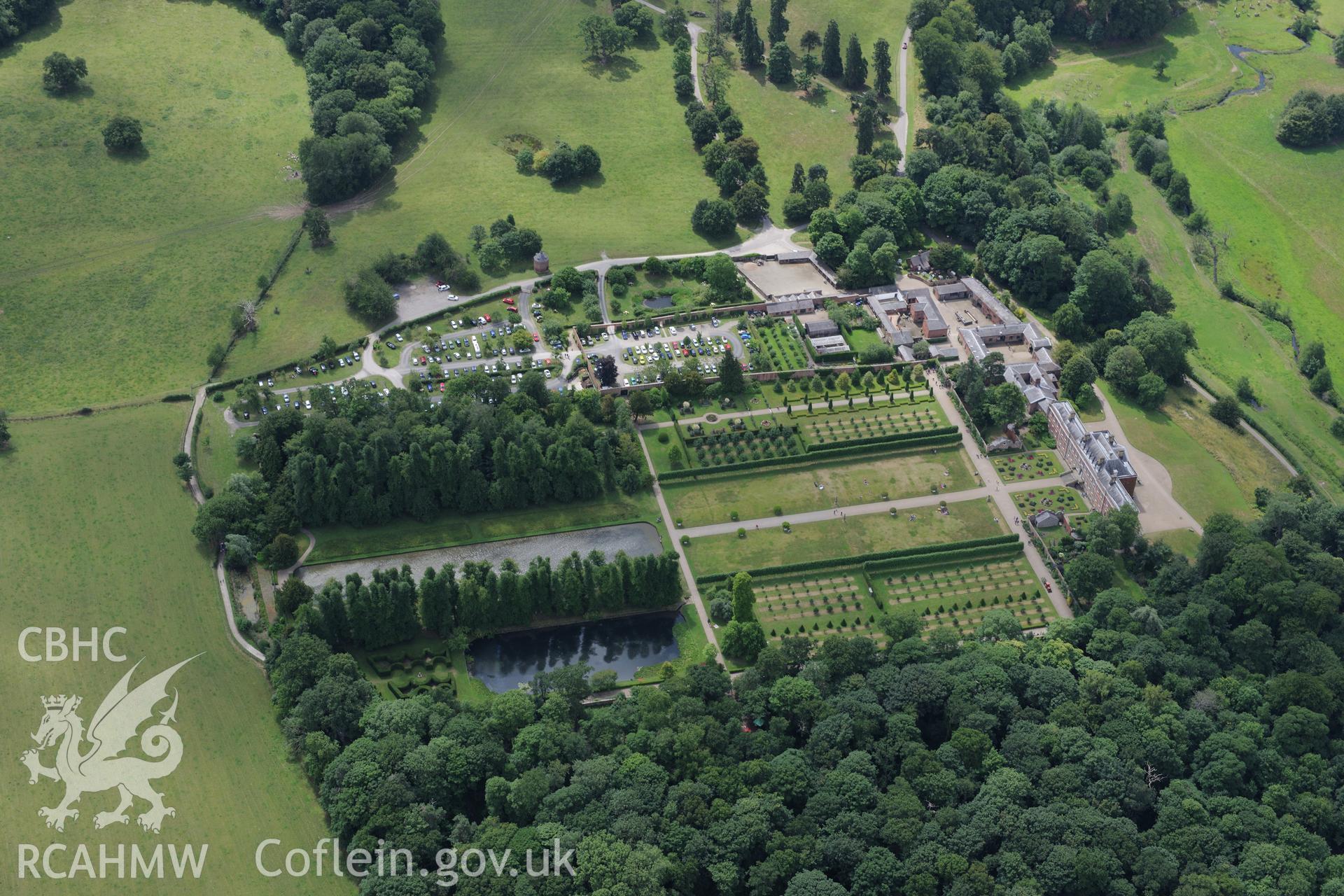 Erddig Hall including garden, stables and gardener's cottage. Oblique aerial photograph taken during the Royal Commission's programme of archaeological aerial reconnaissance by Toby Driver on 30th July 2015.