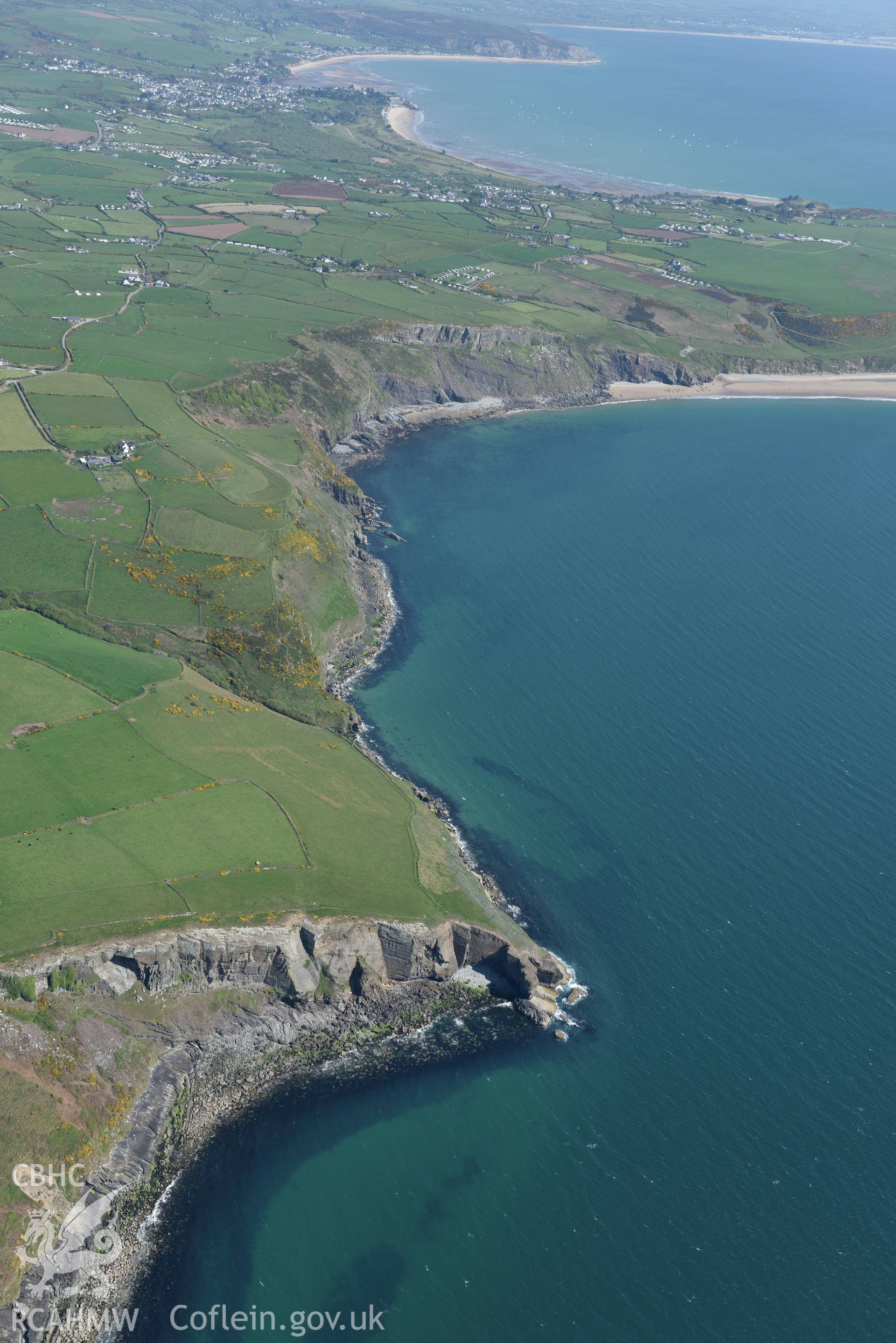 Aerial photography of Cilan Uchaf chambered tomb taken on 3rd May 2017.  Baseline aerial reconnaissance survey for the CHERISH Project. ? Crown: CHERISH PROJECT 2017. Produced with EU funds through the Ireland Wales Co-operation Programme 2014-2020. All material made freely available through the Open Government Licence.