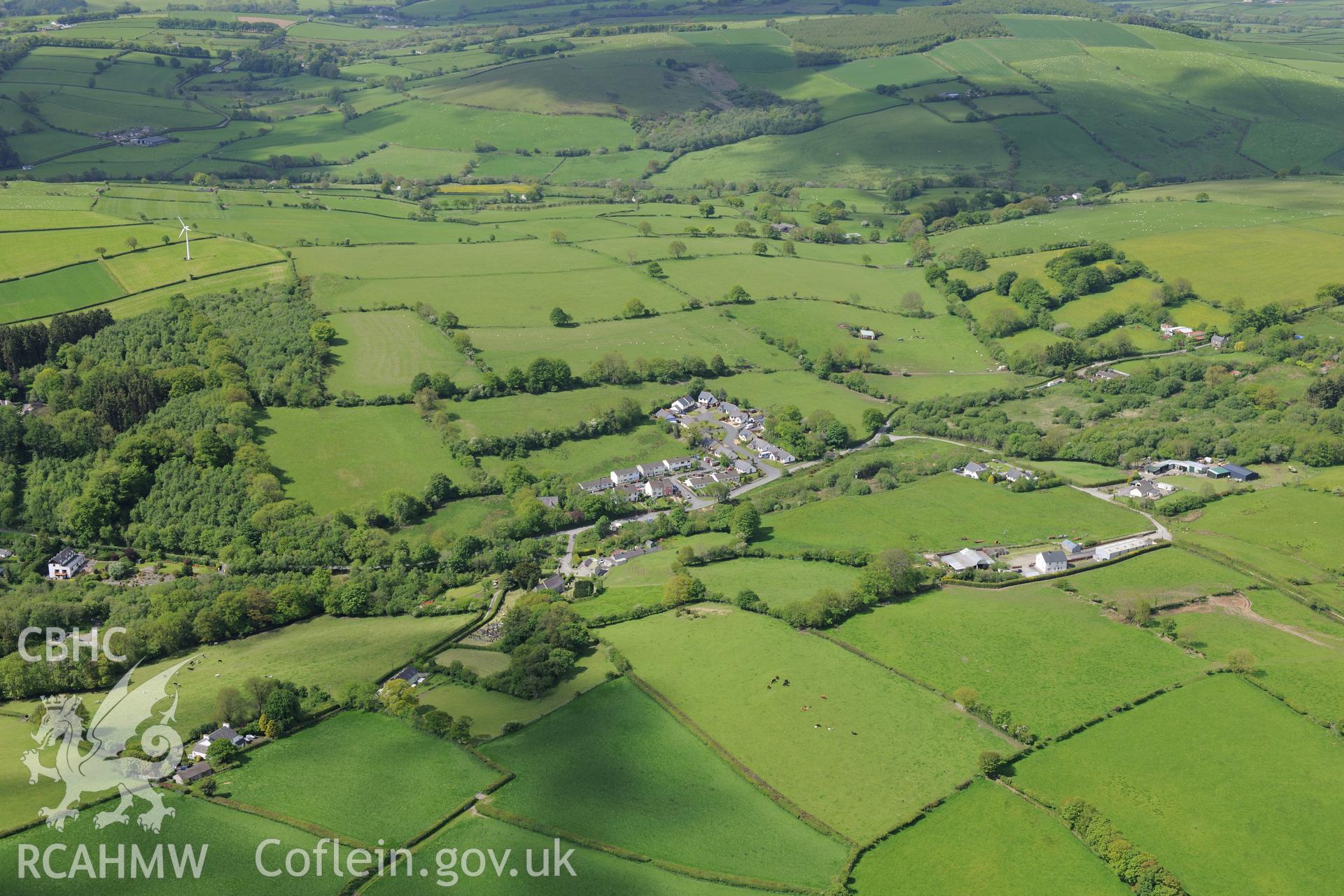 St. Sulien's Church and the village of Silian. Oblique aerial photograph taken during the Royal Commission's programme of archaeological aerial reconnaissance by Toby Driver on 3rd June 2015.