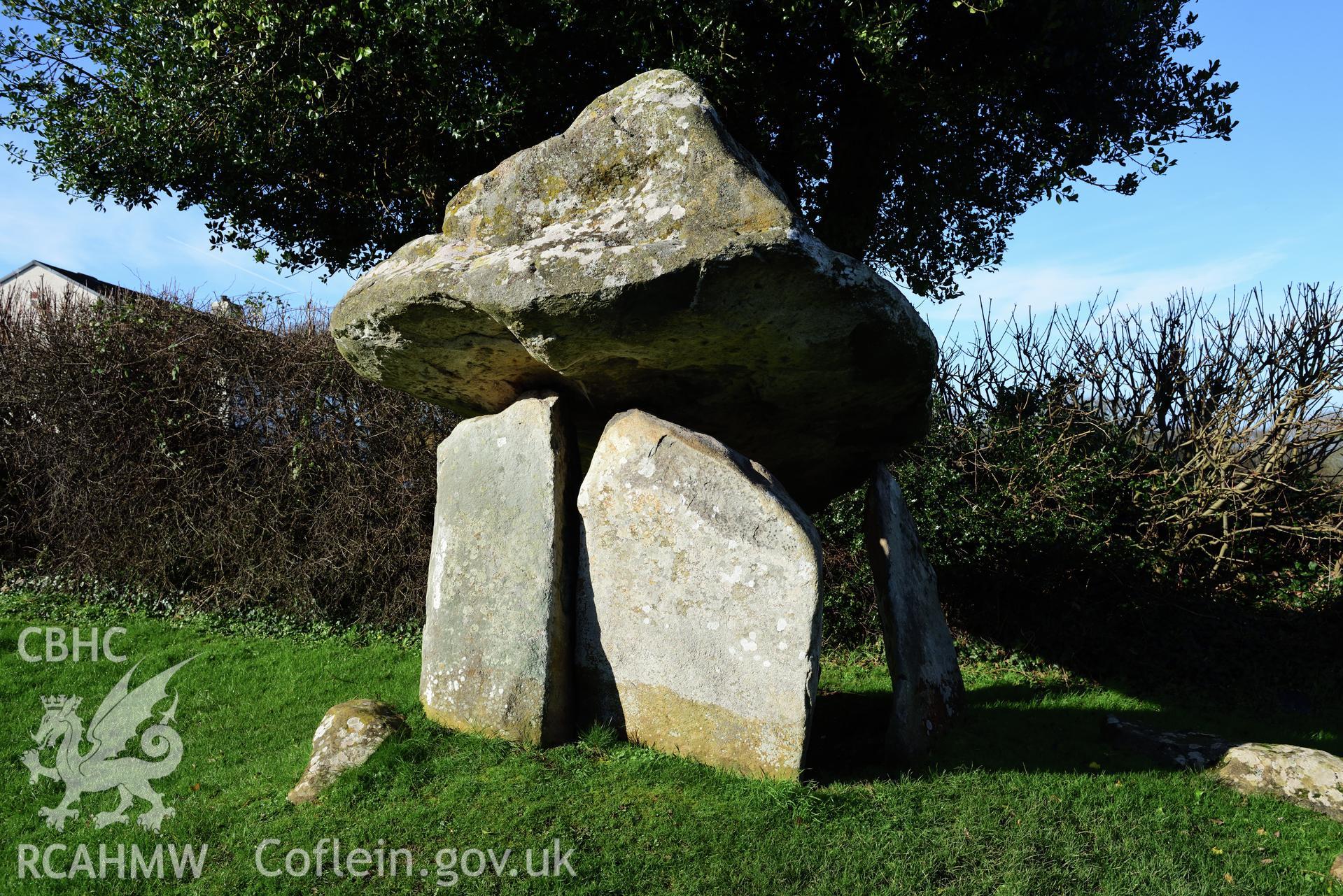 Royal Commission photo survey of Carreg Coetan chambered tomb in winter light, by Toby Driver