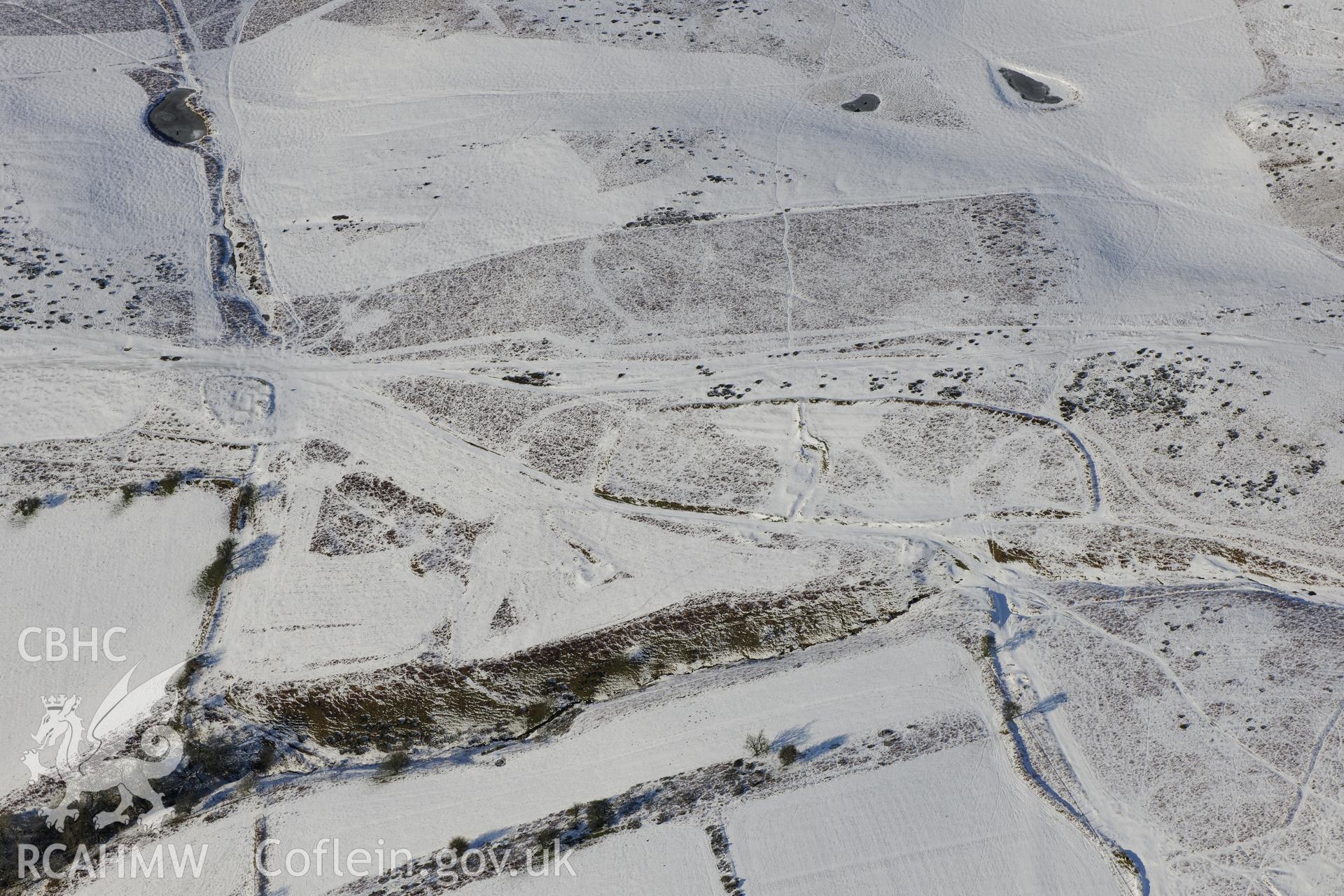 Deserted rural settlement on Aberedw Hill, east of Builth Wells. Oblique aerial photograph taken during the Royal Commission?s programme of archaeological aerial reconnaissance by Toby Driver on 15th January 2013.