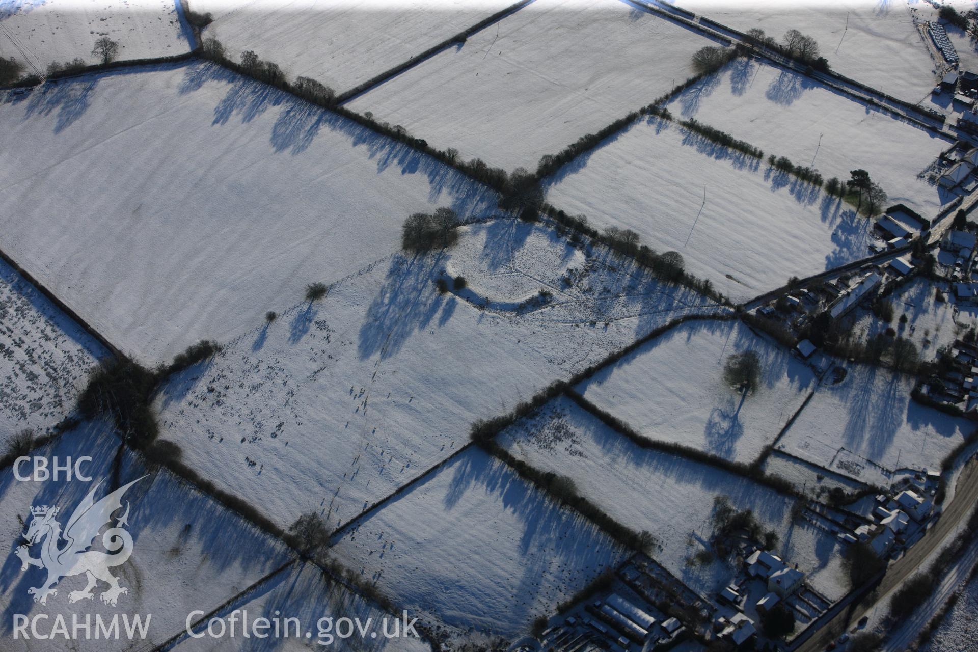 Caer du defended enclosure and another defended enclosure 100 metres to its north, Howey, south west of Llandrindod Wells. Oblique aerial photograph taken during the Royal Commission?s programme of archaeological aerial reconnaissance by Toby Driver on 15th January 2013.