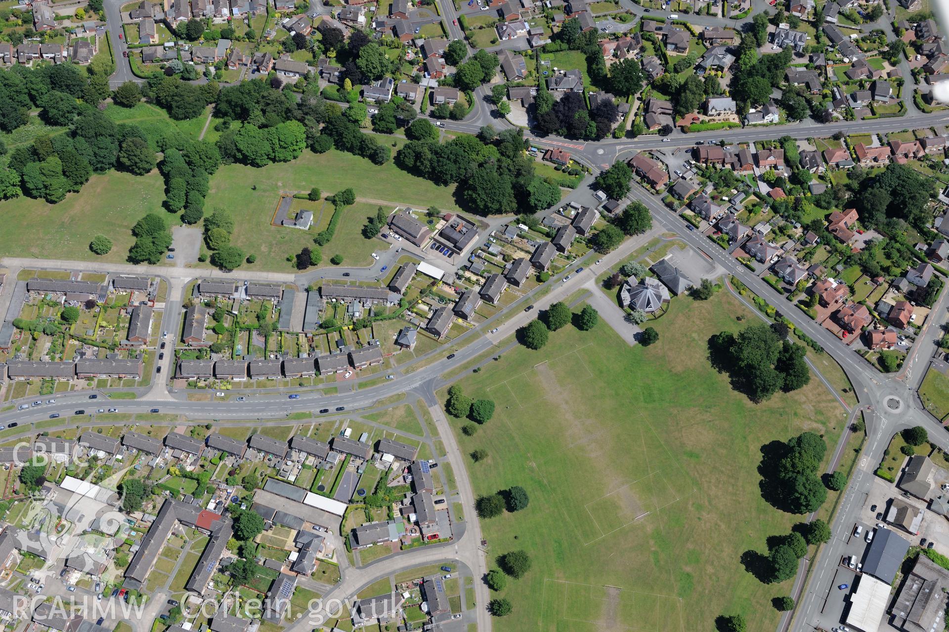 St. John's Church, Rhosnesni, Wrexham. Oblique aerial photograph taken during the Royal Commission's programme of archaeological aerial reconnaissance by Toby Driver on 30th June 2015.