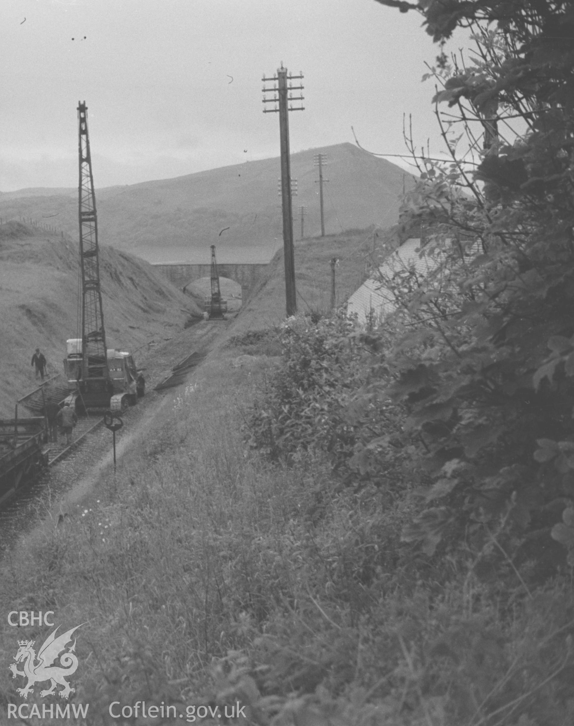 Digital copy of a black and white negative showing the dismantling of the railway at Tanybwlch, near Aberystwyth. Photographed by Arthur O. Chater in June 1966.