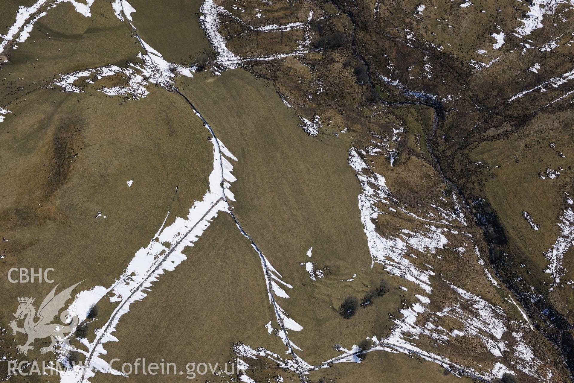 Settlement I at Blaen-Glasffrwd, south east of Pontrhydfendigaid. Oblique aerial photograph taken during the Royal Commission's programme of archaeological aerial reconnaissance by Toby Driver on 2nd April 2013.