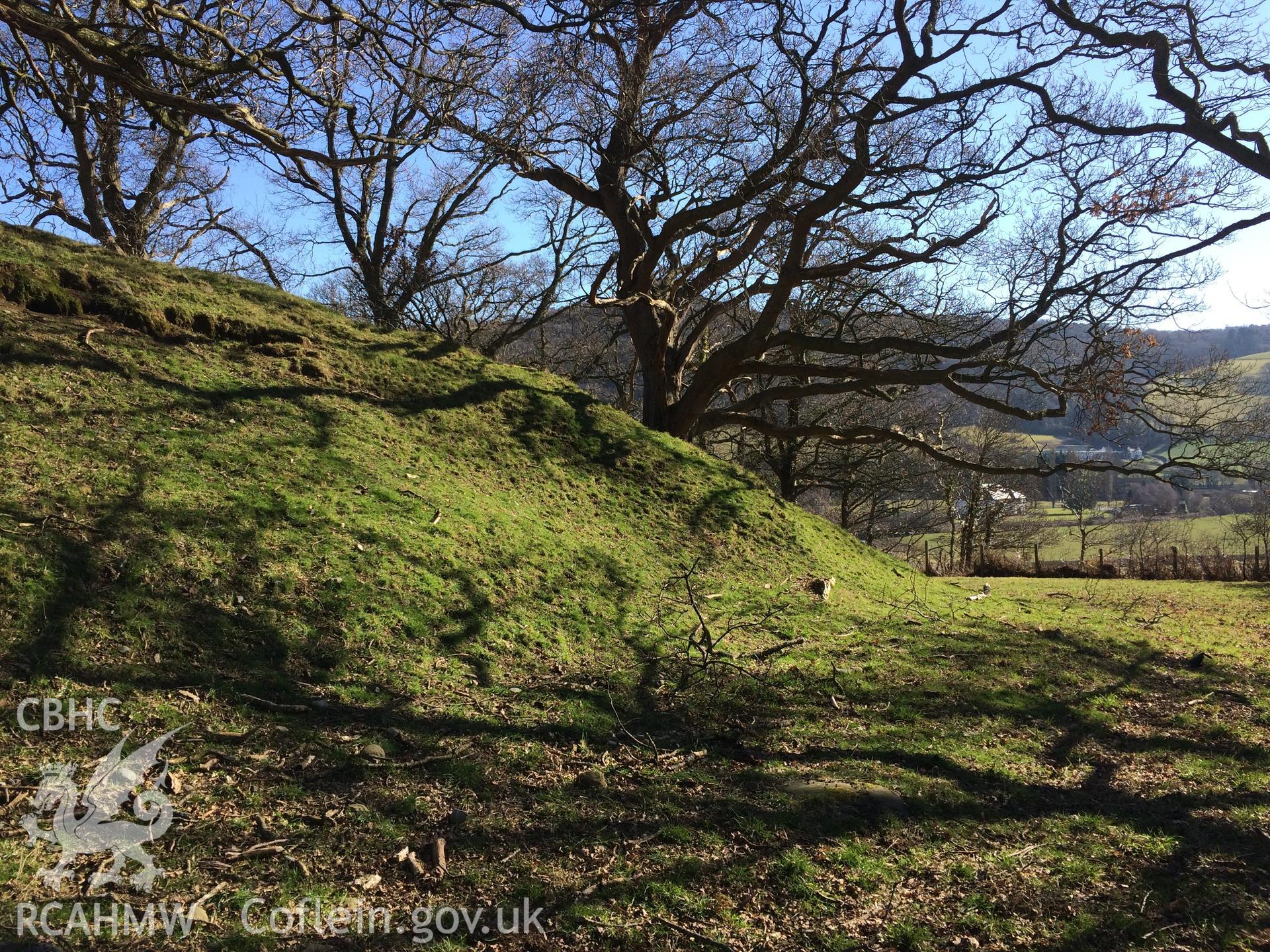 Colour photo showing view of Tal-y-cafn motte, taken by Paul R. Davis, 28th February 2018.