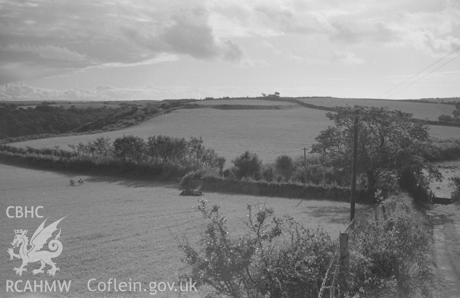 Digital copy of a black and white negative showing view of Gilfach Hael camp. Photographed by Arthur O. Chater in September 1964 from Grid Reference SN 5625 7027, looking west south west.