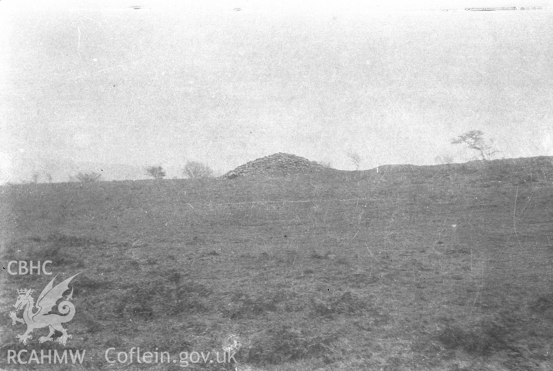 Digital copy of a nitrate negative showing Bryn Owen Farm cairns, Llanbradach. From the Cadw Monuments in Care Collection.