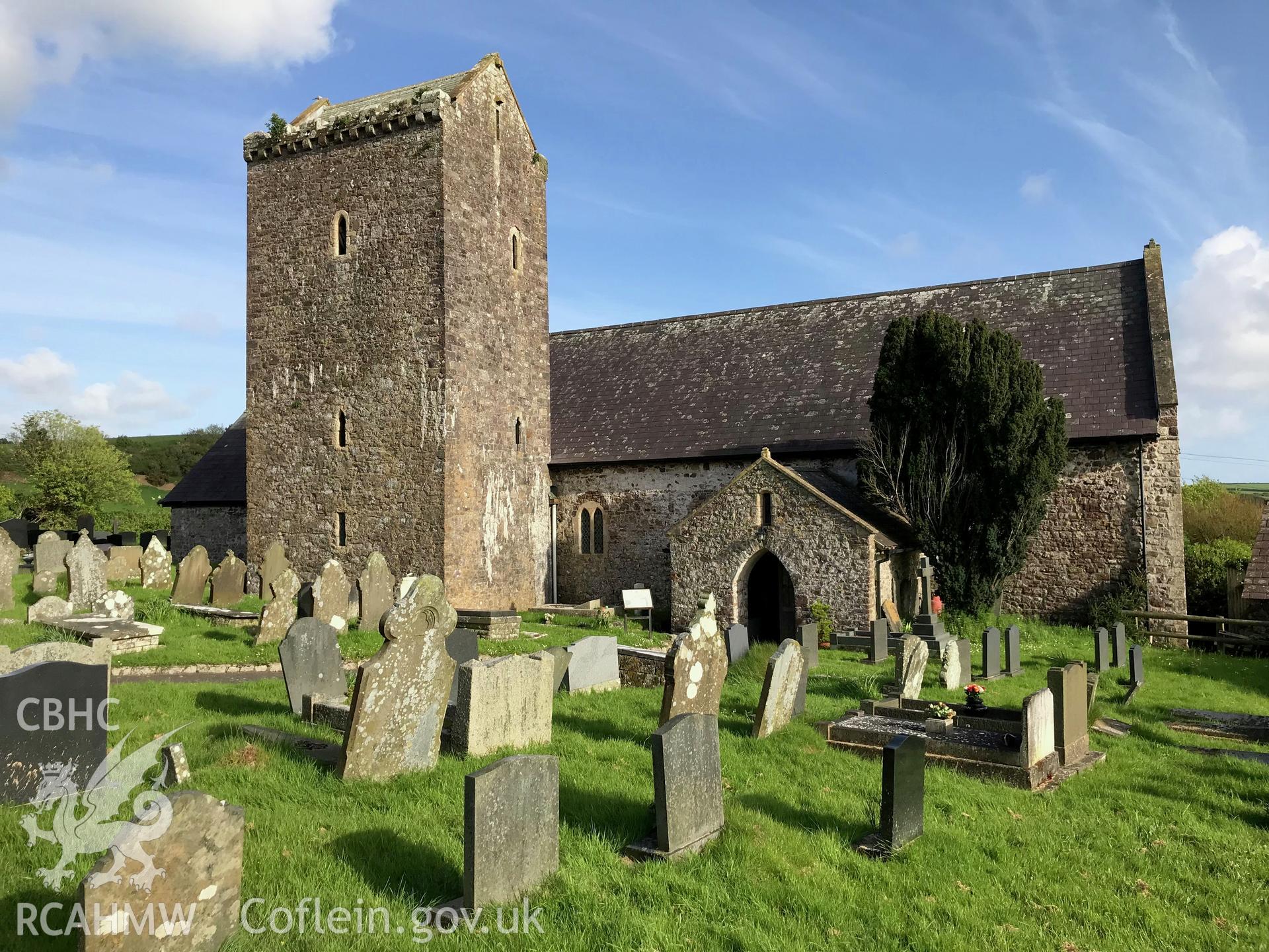 Colour photo showing external view of St. Cenydd's Church and graveyard, Llangenydd, taken by Paul R. Davis, 10th May 2018.