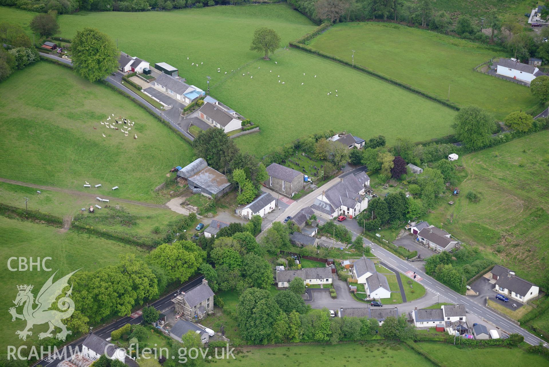 The village of Rhydowen, showing Yr Hen Gapel; Allyrodyn Arms and Alltyrodyn Arms pigsty and stable. Oblique aerial photograph taken during the Royal Commission's programme of archaeological aerial reconnaissance by Toby Driver on 3rd June 2015.