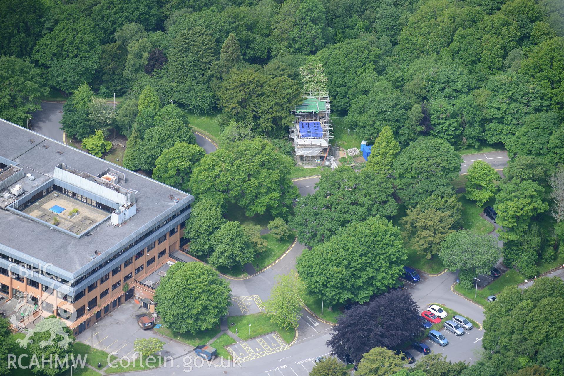 The Equatorial Observatory; Lliw Valley (or Penllergaer) civic centre and the site of Penllergaer House at Penllergaeth Park, Swansea. Oblique aerial photograph taken during the Royal Commission's programme of archaeological aerial reconnaissance by Toby Driver on 19th June 2015.