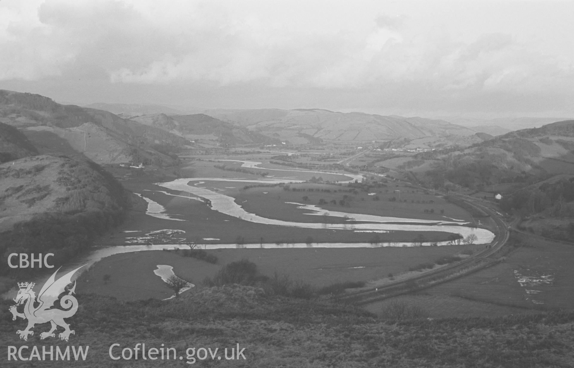 Digital copy of a black and white negative showing view of Machynlleth and the Afon Dyfi from the west. Photographed by Arthur O. Chater on 31st December 1966.