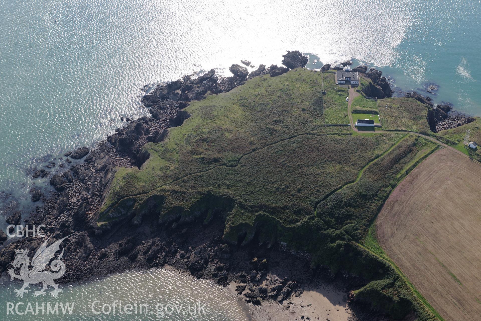 Great Castle Head, the Leading Lights Sandyhaven Estate and the estate's Summerhouse, St. Ishmaels, west of Milford Haven. Oblique aerial photograph taken during the Royal Commission's programme of archaeological aerial reconnaissance by Toby Driver on 30th September 2015.