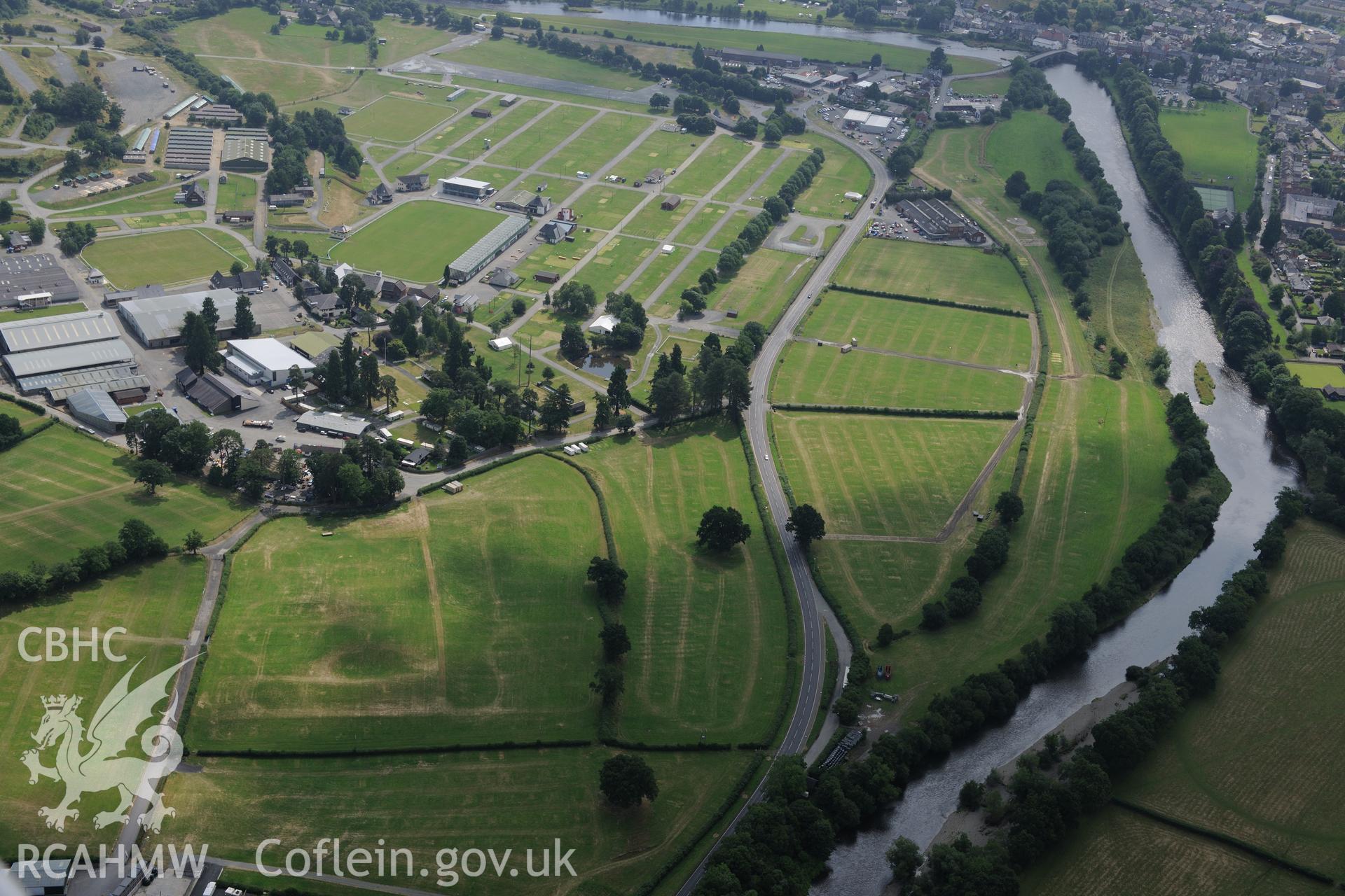 The Royal Welsh Showground, Llanelwedd. Oblique aerial photograph taken during the Royal Commission?s programme of archaeological aerial reconnaissance by Toby Driver on 1st August 2013.