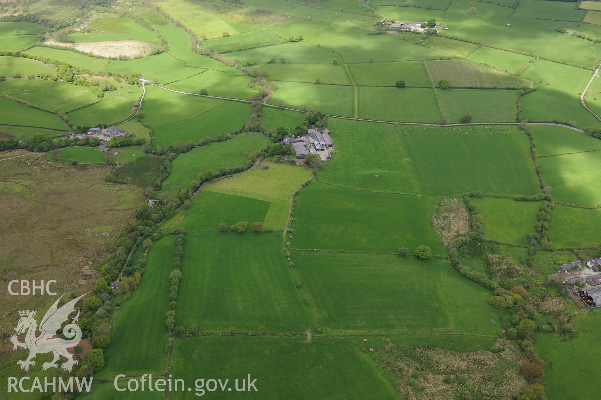 Wern Felen farm, Old Abbey farm and the site of Hen Fynachlog, Ystrad Fflur. Oblique aerial photograph taken during the Royal Commission's programme of archaeological aerial reconnaissance by Toby Driver on 3rd June 2015.