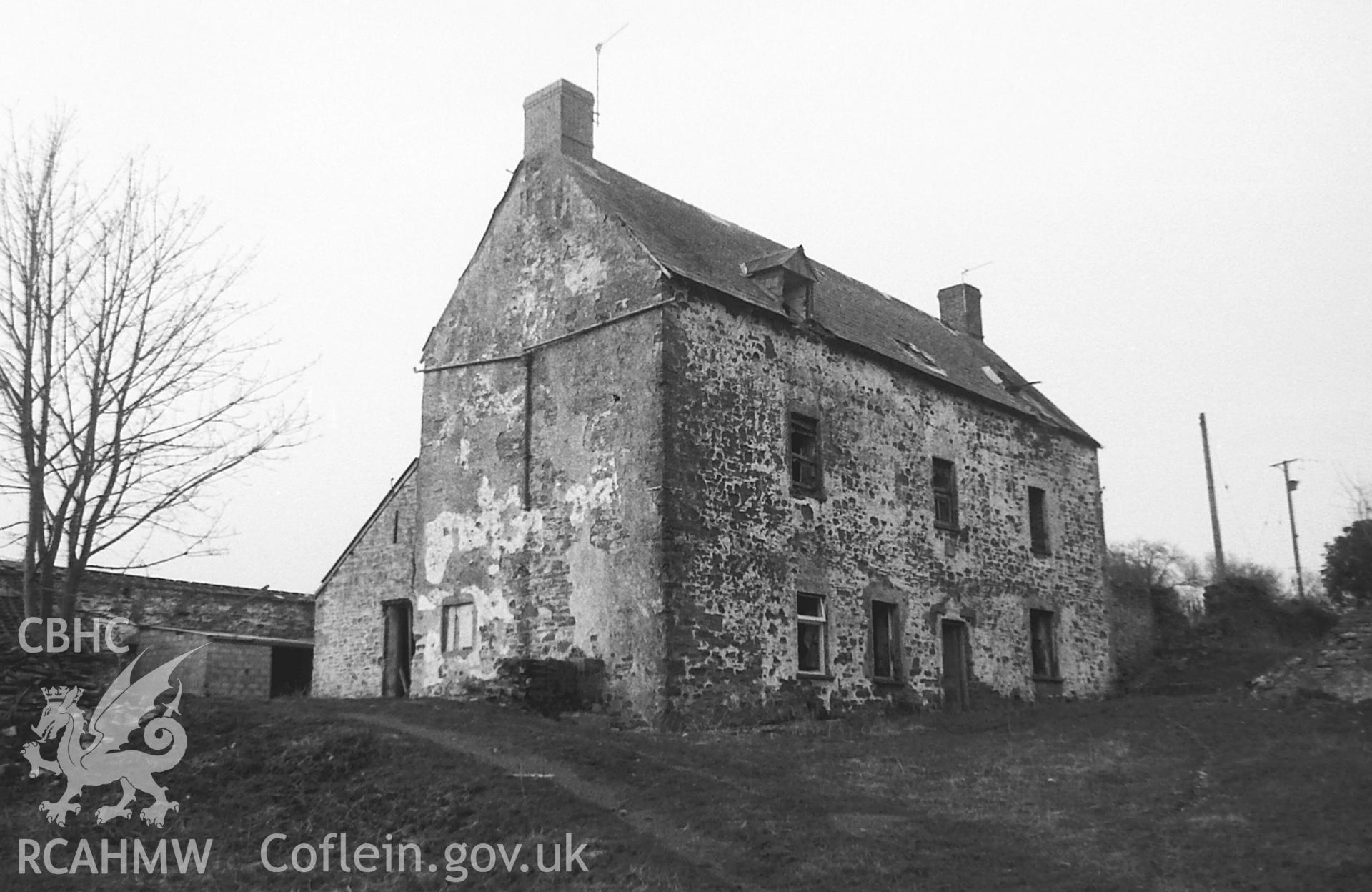 Digitised black and white photograph showing exterior view of Penrhos Farmhouse, Caerleon, taken by Paul Davis in 1997.