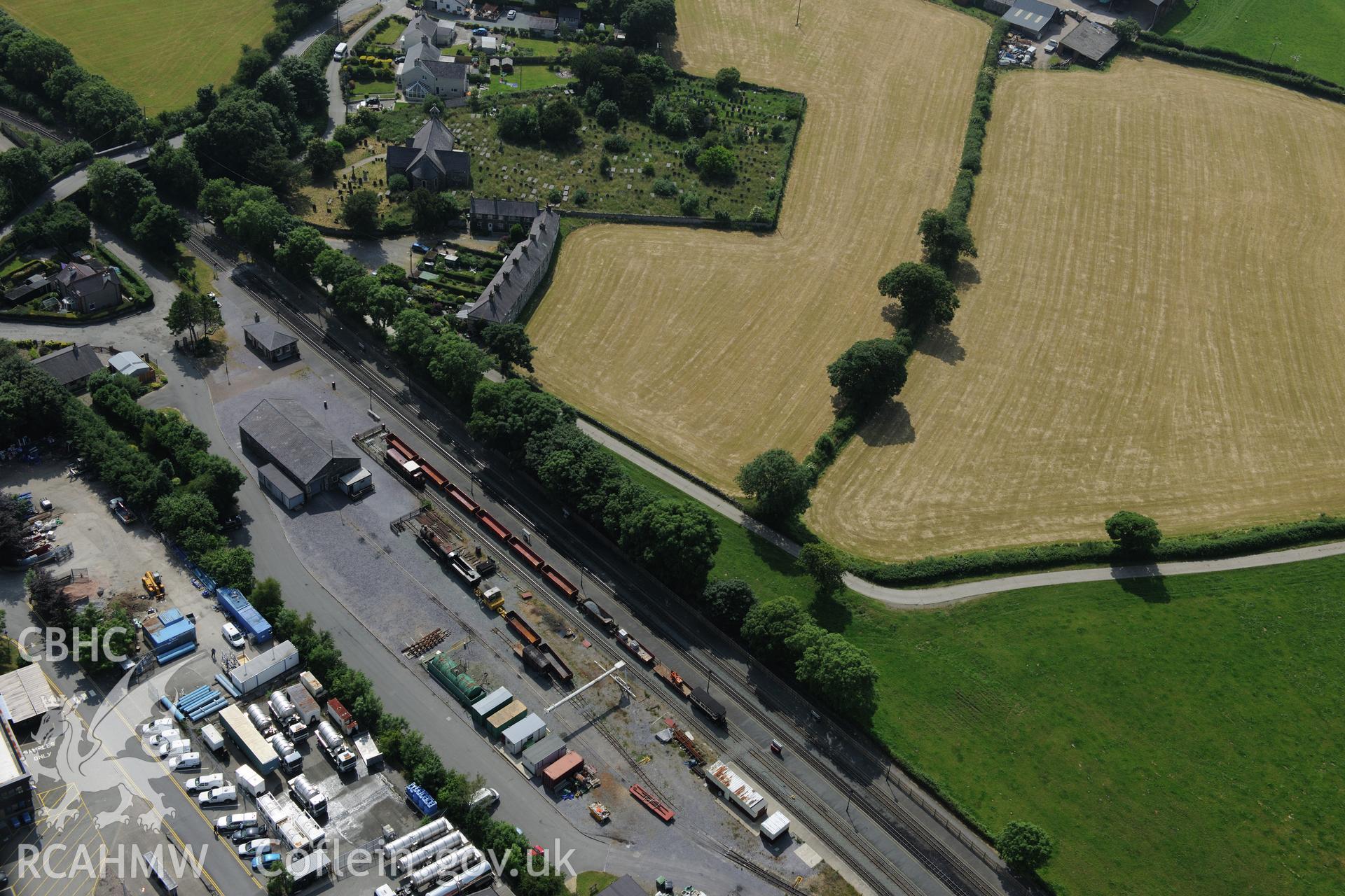 Dinas Junction railway station, Welsh Highland Railway. Oblique aerial photograph taken during the Royal Commission?s programme of archaeological aerial reconnaissance by Toby Driver on 12th July 2013.