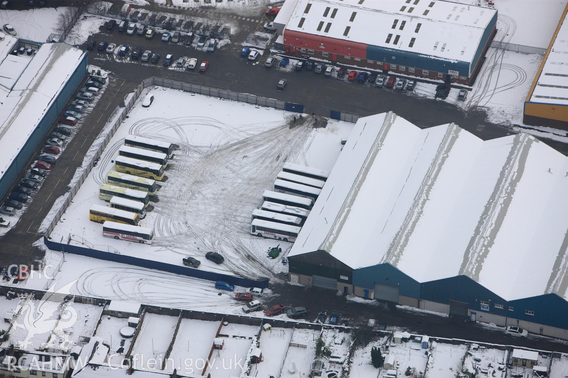 Trecenydd bus station under snow and ice, Trecenydd, Caerphilly. Oblique aerial photograph taken during the Royal Commission?s programme of archaeological aerial reconnaissance by Toby Driver on 24th January 2013.