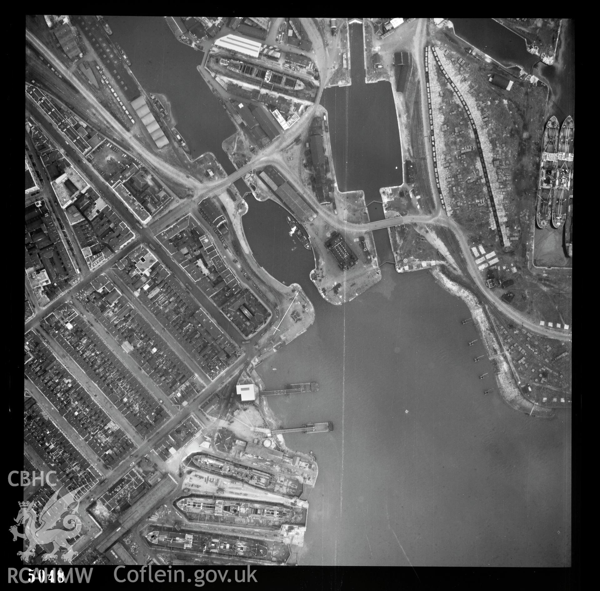 Digital copy of a black and white vertical aerial photograph taken by the RAF on 14/08/1948 showing Roath Dock area of Cardiff.