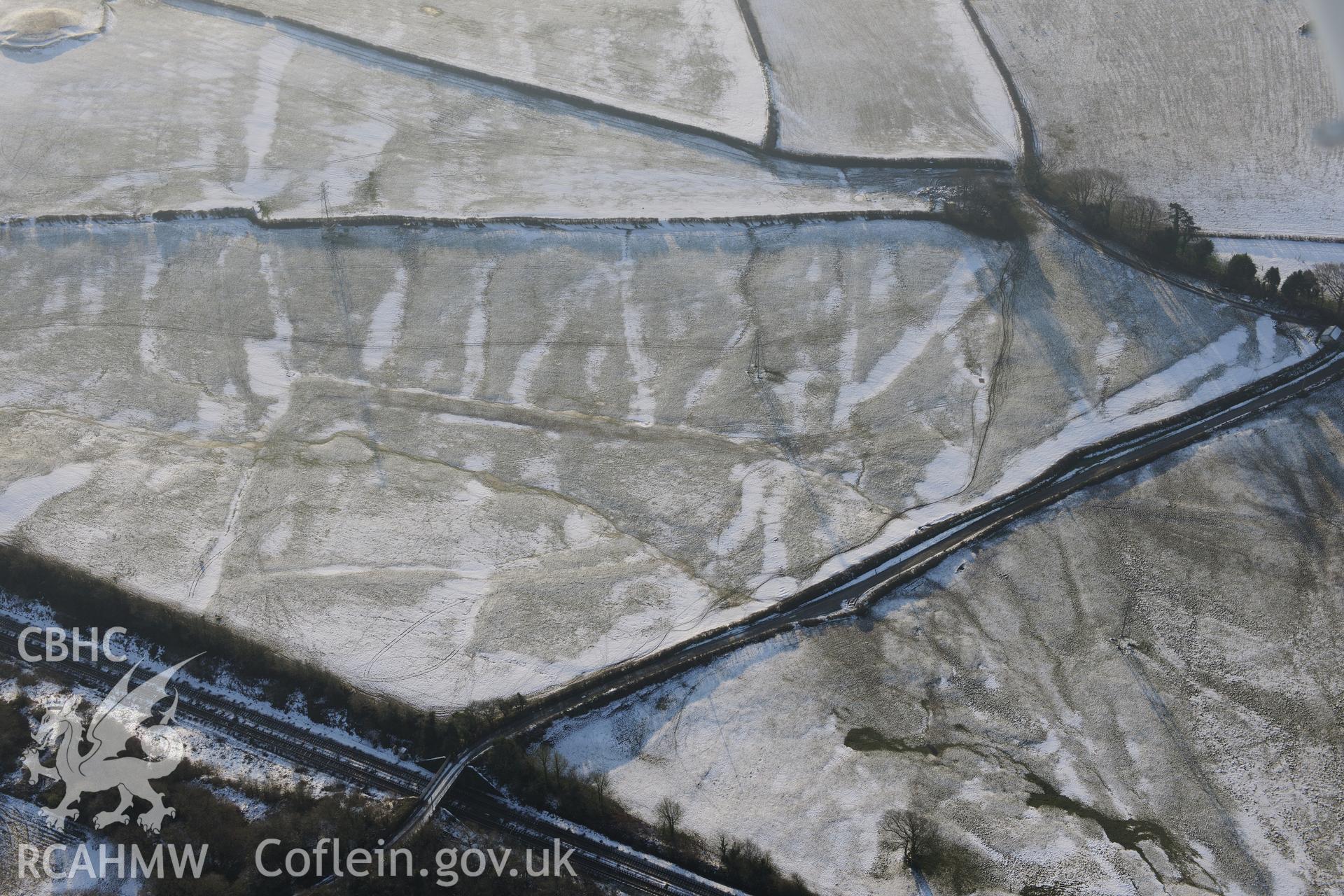 Stormy Grange, south east of Pyle, Bridgend. Oblique aerial photograph taken during the Royal Commission?s programme of archaeological aerial reconnaissance by Toby Driver on 24th January 2013.