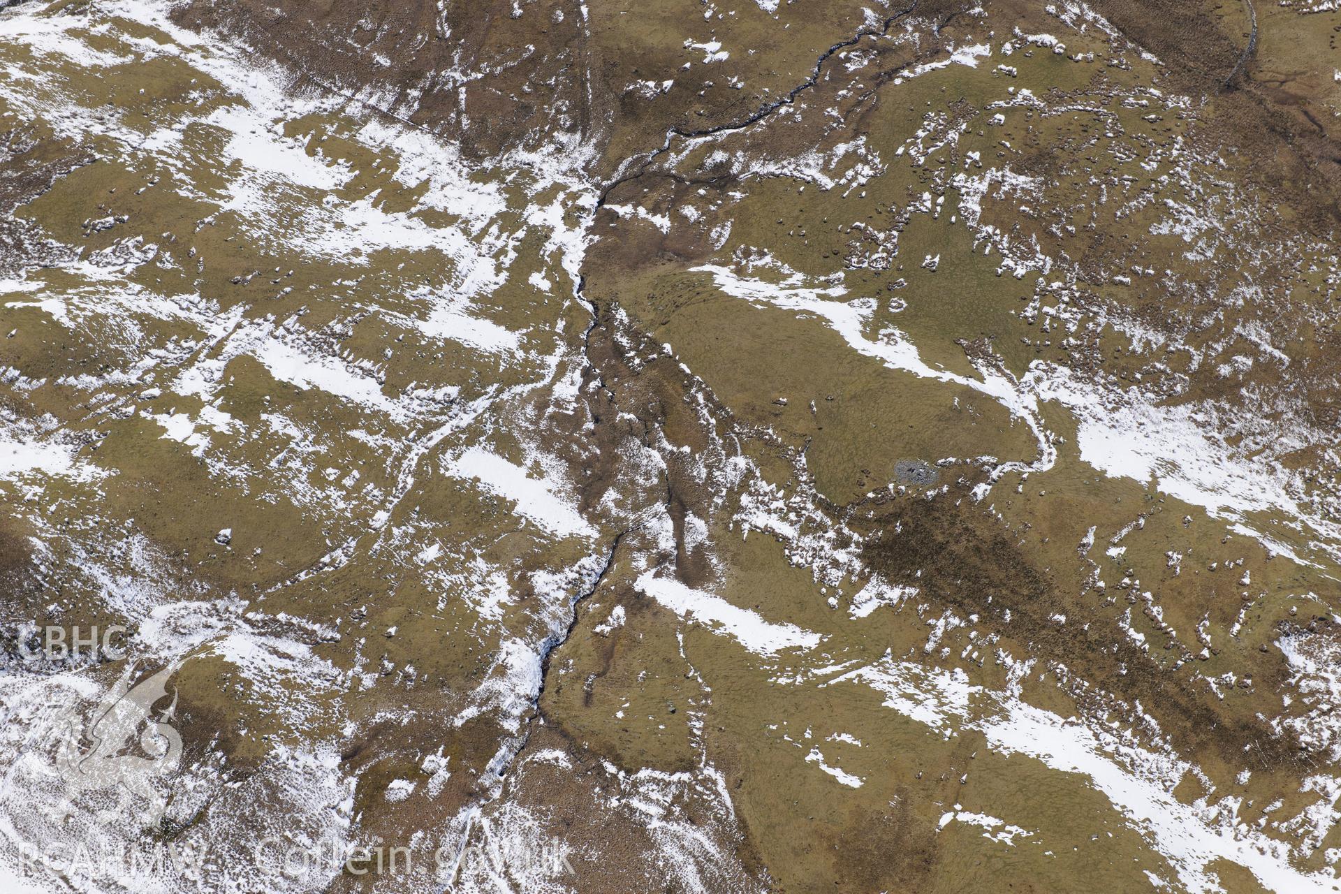 Cairns at Blaen-Glasffrwd, south east of Pontrhydfendigaid. Oblique aerial photograph taken during the Royal Commission's programme of archaeological aerial reconnaissance by Toby Driver on 2nd April 2013.