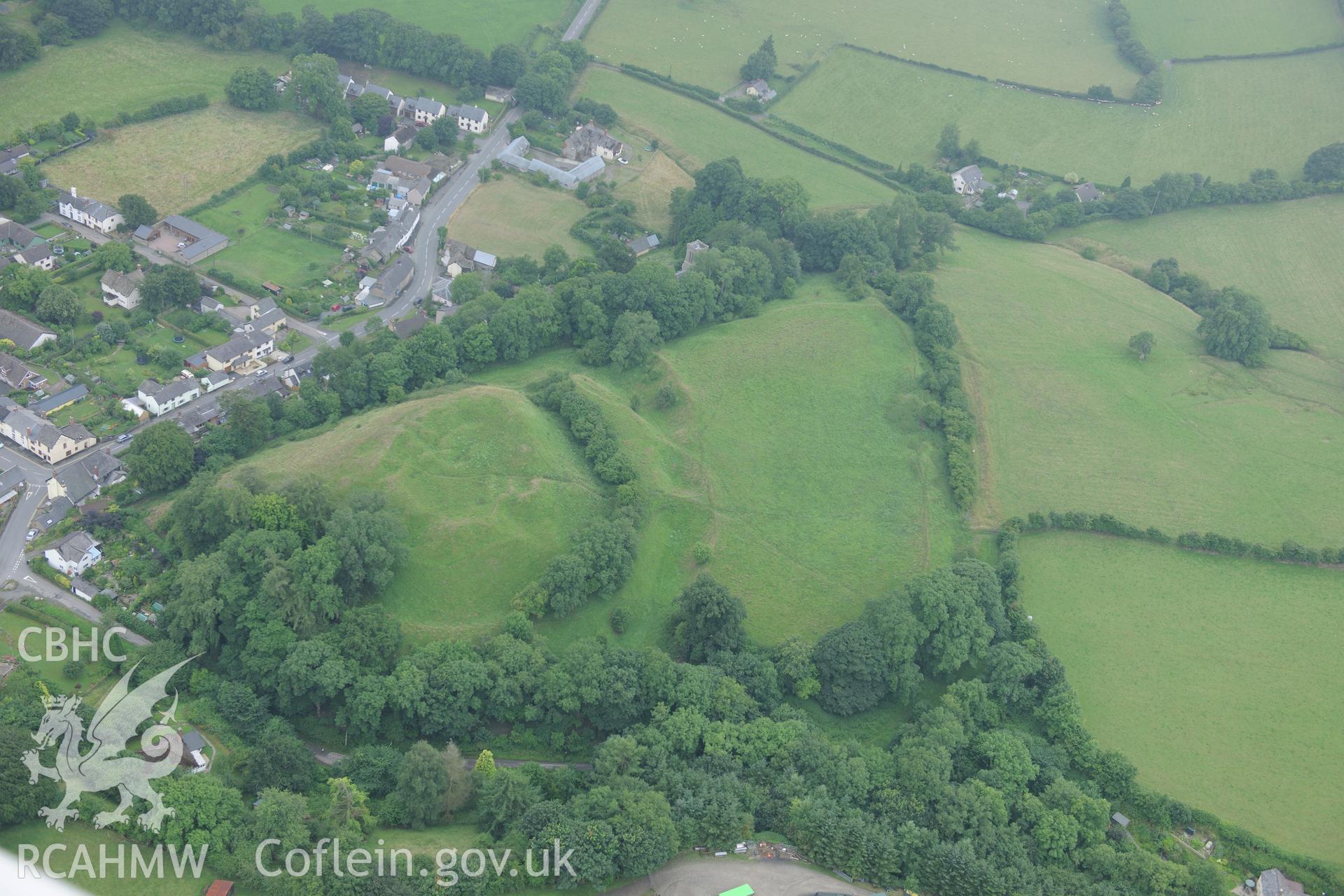 New Radnor Castle, on the north western edge of New Radnor town. Oblique aerial photograph taken during the Royal Commission?s programme of archaeological aerial reconnaissance by Toby Driver on 1st August 2013.