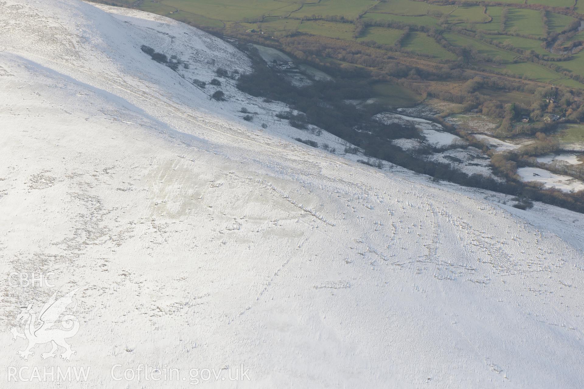 Graig Fawr (west) enclosure or possible hillfort, north of Pontarddulais. Oblique aerial photograph taken during the Royal Commission?s programme of archaeological aerial reconnaissance by Toby Driver on 24th January 2013.