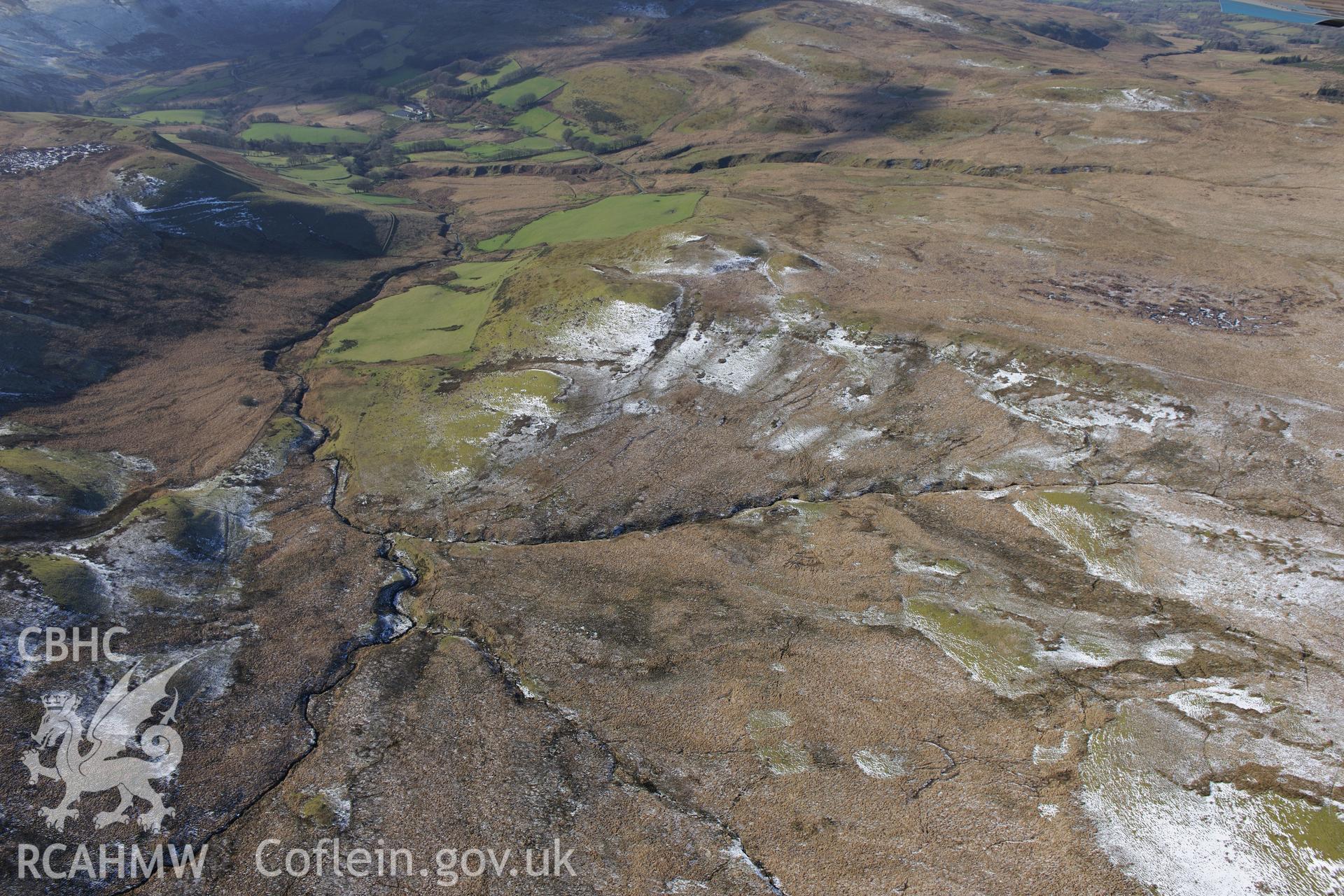 Blaen Brefi longhouse, south east of Tregaron. Oblique aerial photograph taken during the Royal Commission's programme of archaeological aerial reconnaissance by Toby Driver on 4th February 2015.
