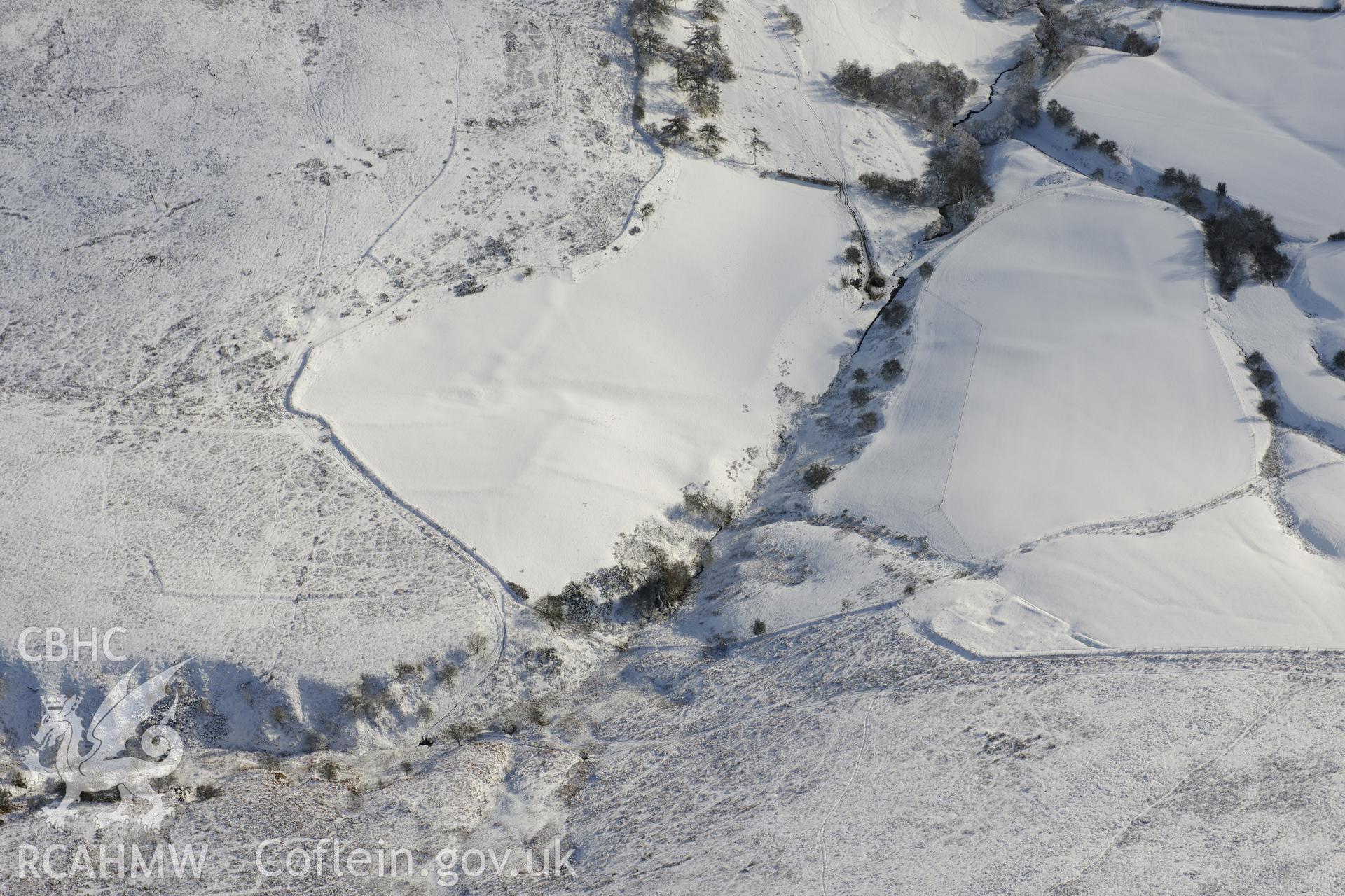 Cwm-Twrch Medieval platform settlement, Glascwm. Oblique aerial photograph taken during the Royal Commission?s programme of archaeological aerial reconnaissance by Toby Driver on 15th January 2013.