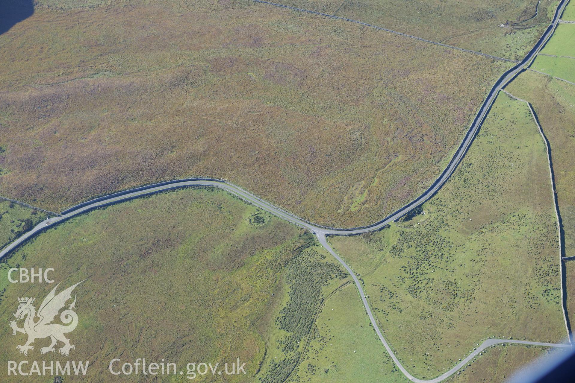 The Cregennan cairn and standing stones east of Hafotty Fach, on Tyrrau Mawr, Cadair Idris. Oblique aerial photograph taken during the Royal Commission's programme of archaeological aerial reconnaissance by Toby Driver on 2nd October 2015.