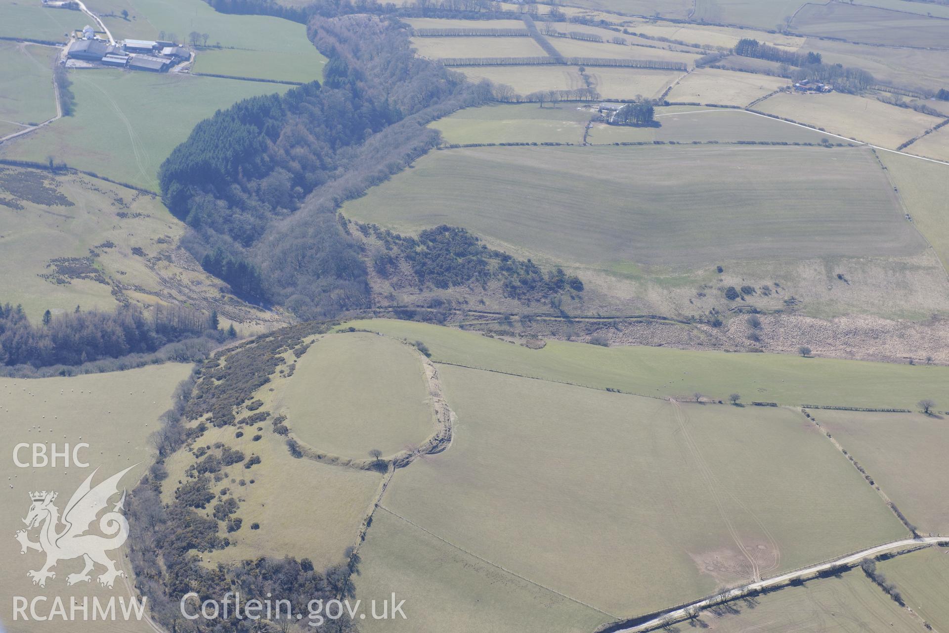 Castell Moeddyn defended enclosure or hillfort north of Gorsgoch, near Lampeter. Oblique aerial photograph taken during the Royal Commission's programme of archaeological aerial reconnaissance by Toby Driver on 2nd April 2013.