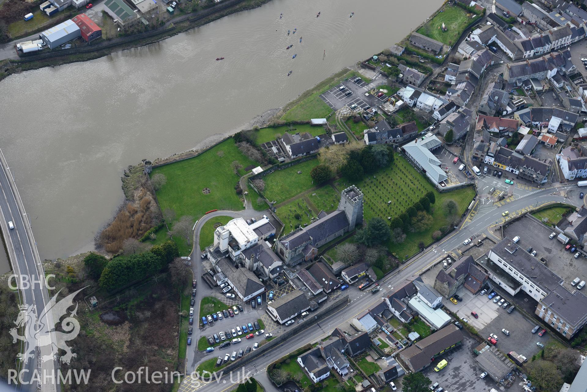 Cardigan Memorial Hospital; St. Mary's church and St. Mary's Priory, Cardigan. Oblique aerial photograph taken during the Royal Commission?s programme of archaeological aerial reconnaissance by Toby Driver on 13th March 2015.