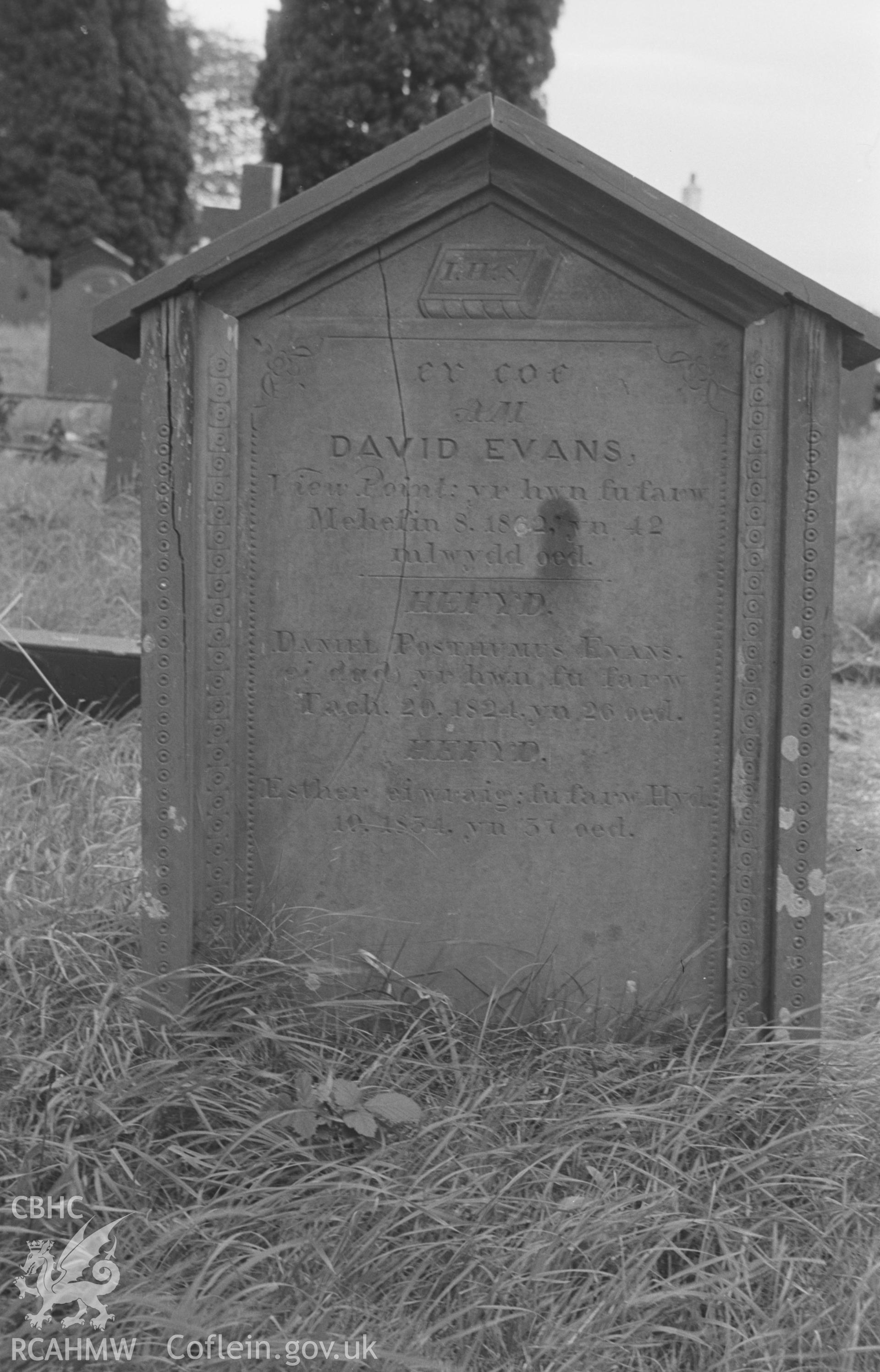 Digital copy of a black and white negative showing gravestone to the memory of the Evans family, at St. David's Church, Henfynyw, Aberaeron. Photographed by Arthur O. Chater on 5th September 1966 from Grid Reference SN 447 613.