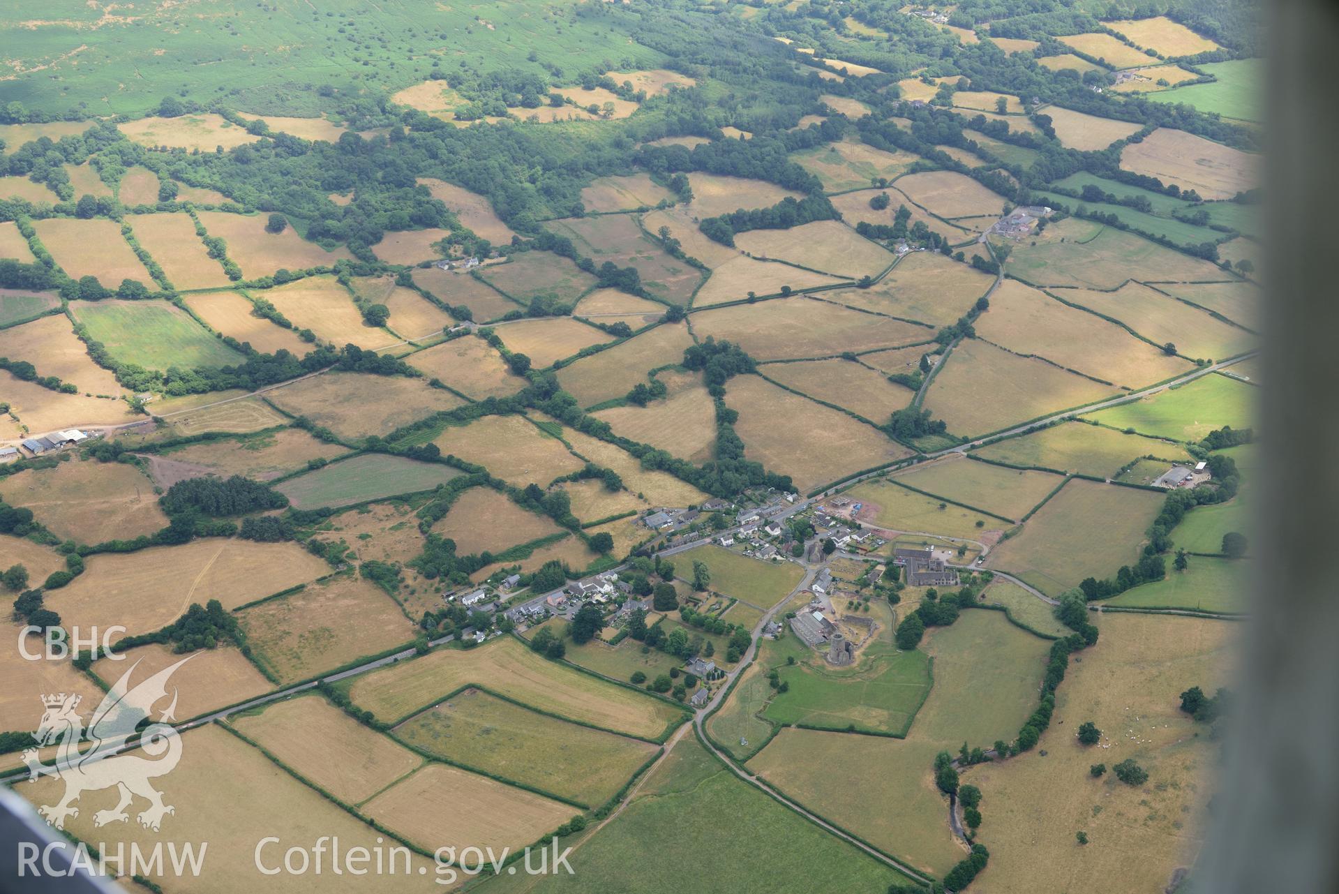 Royal Commission aerial photography of extensive parchmarks at Pen y Gaer Roman fort, including the internal plan and extramural buildings, taken on 19th July 2018 during the 2018 drought.