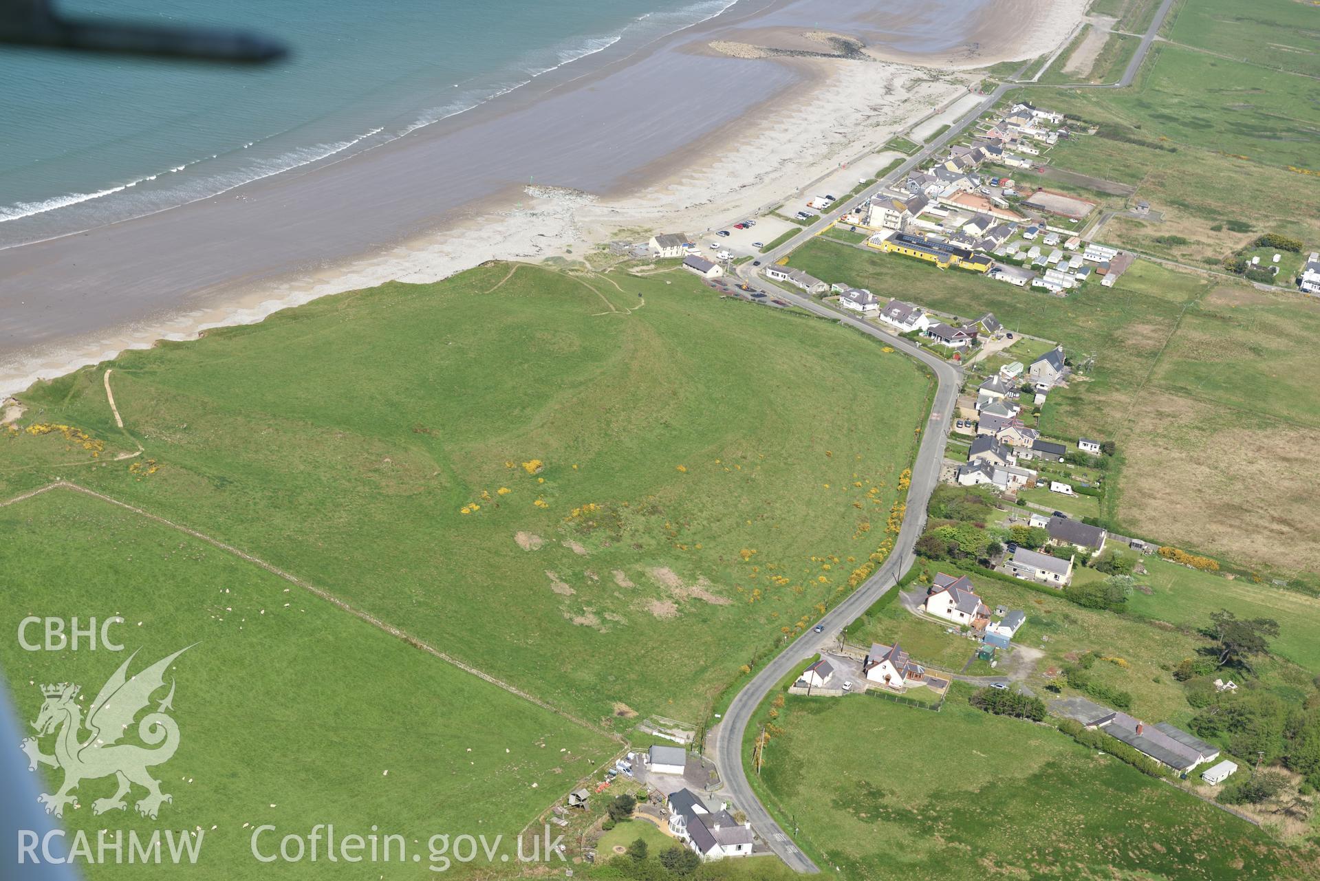 Aerial photography of Dinas Dinlle taken on 3rd May 2017.  Baseline aerial reconnaissance survey for the CHERISH Project. ? Crown: CHERISH PROJECT 2017. Produced with EU funds through the Ireland Wales Co-operation Programme 2014-2020. All material made