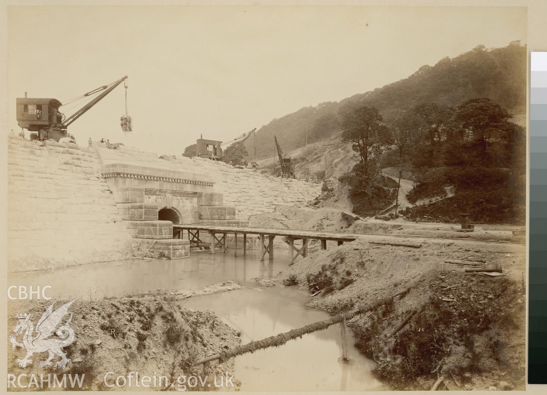 Digital copy of an albumen print from Edward Hubbard Collection. Album 'Lake Vyrnwy Photographs' print entitled 'The Vyrnwy Masonry Dam' showing the outlet end of the northeast discharge tunnel taken June 1886.