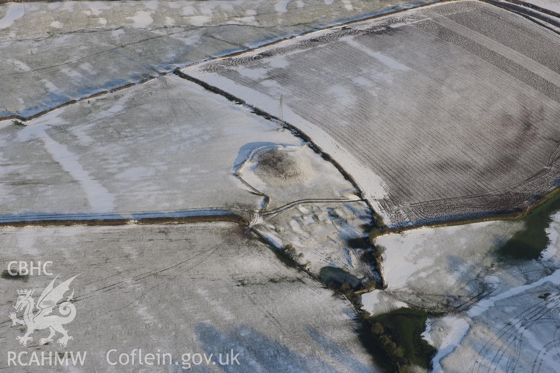 Stormy Castle motte, west of Bridgend. Oblique aerial photograph taken during the Royal Commission?s programme of archaeological aerial reconnaissance by Toby Driver on 24th January 2013.