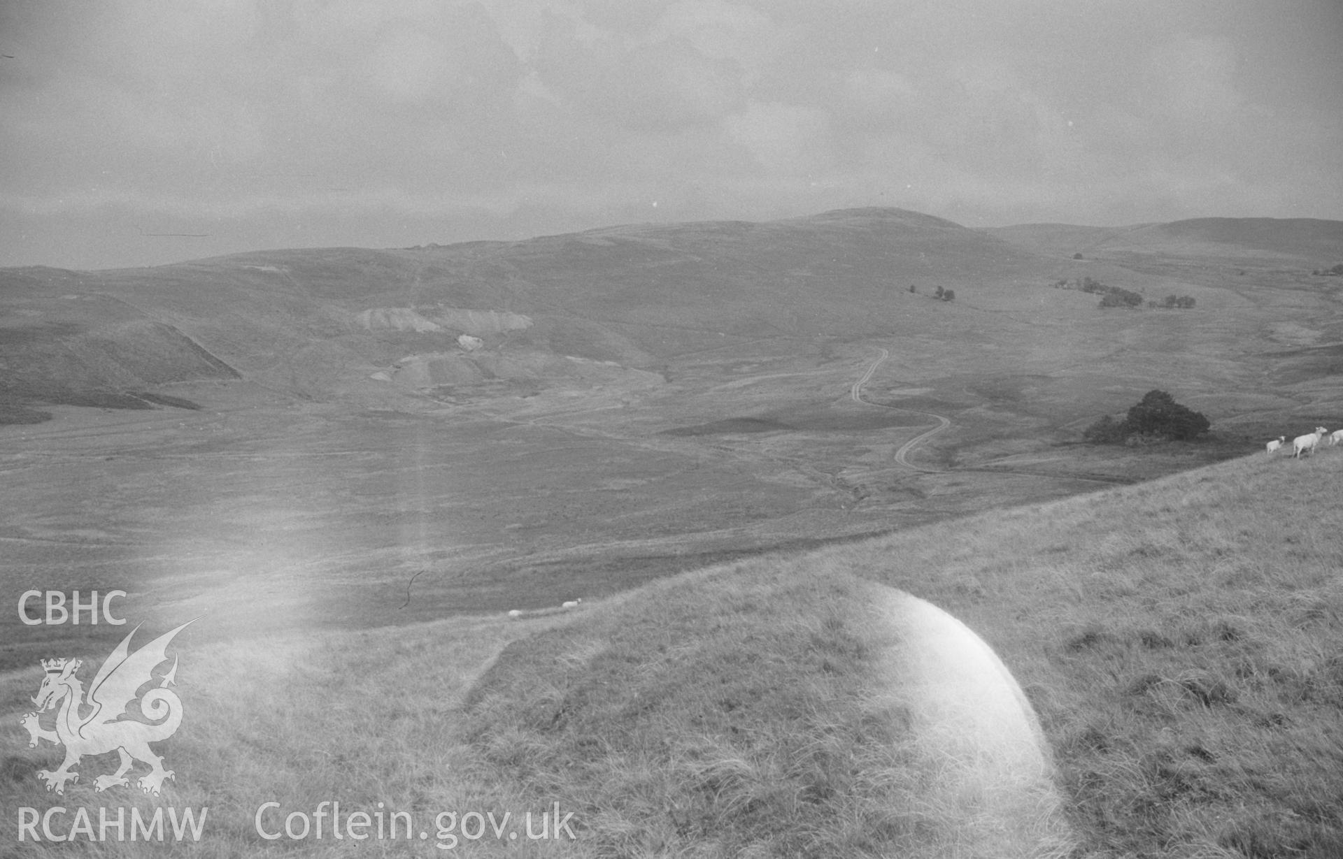 Digital copy of a black and white negative showing Esgair Mwyn Mine from the road from Ffair-Rhos, Ystrad Fflur. Photographed by Arthur O. Chater in August 1966.