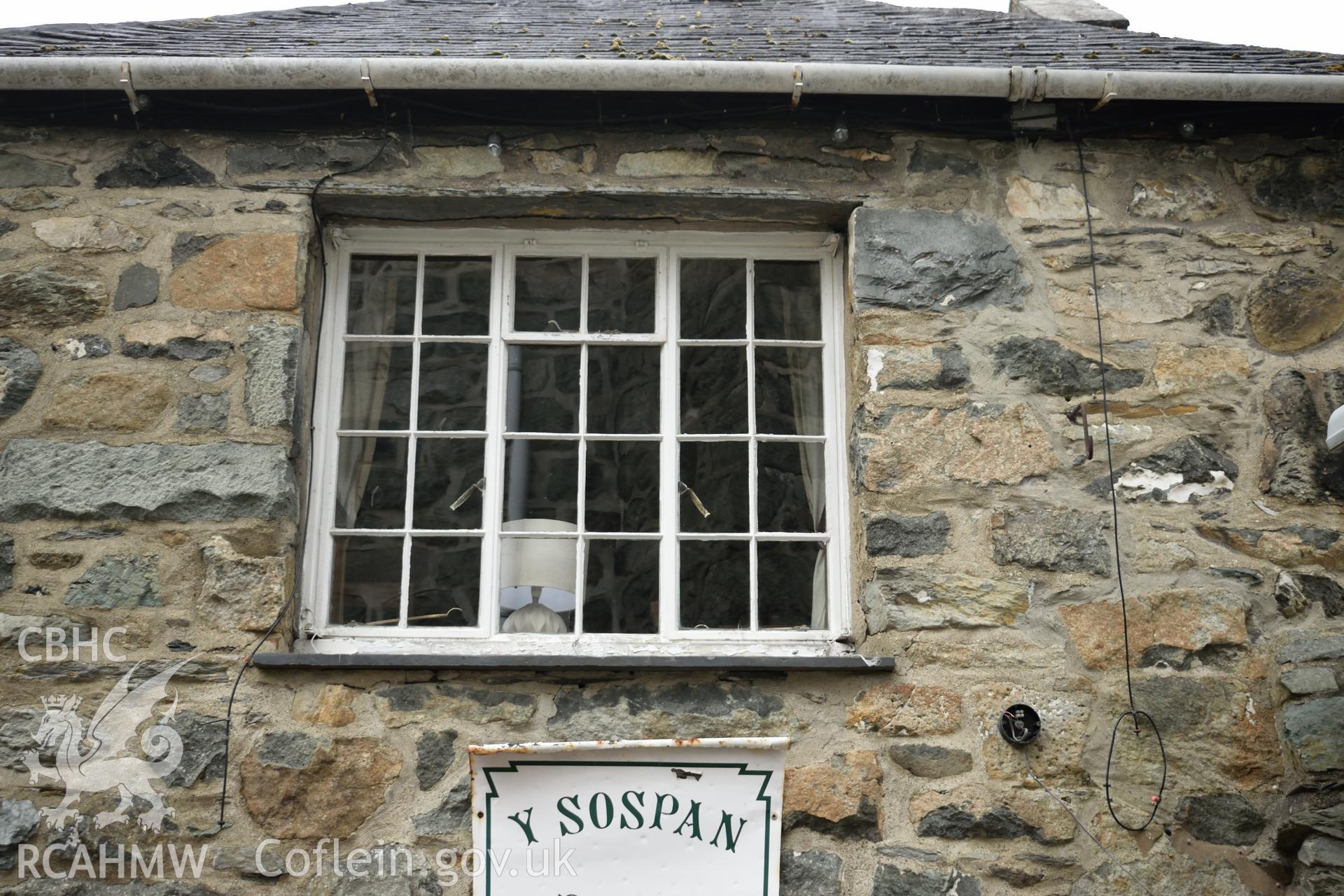 Colour photograph showing view looking north at the upper window in the southern elevation of Y Sospan, Llys Owain, Dolgellau. Photographed by I. P. Brookes of Engineering Archaeological Services, June 2019.