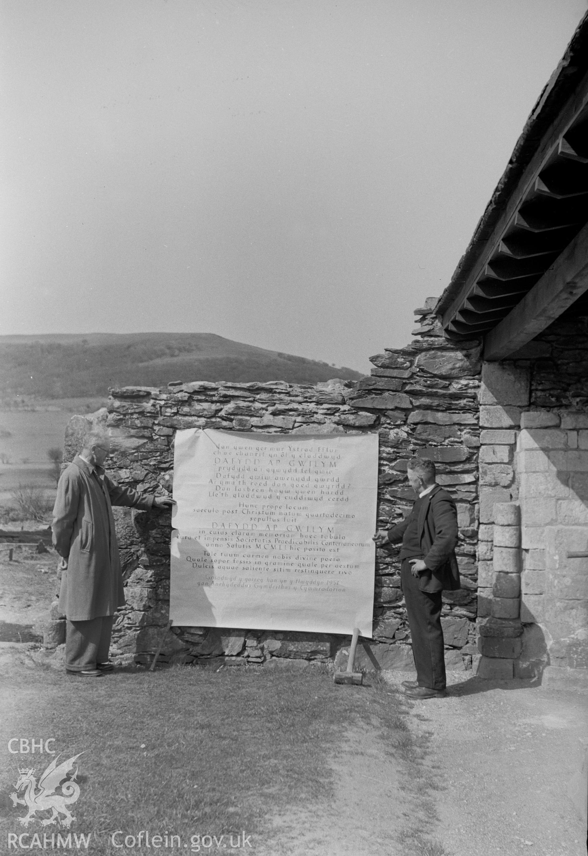 Digital copy of a nitrate negative taken by Leonard Monroe, showing view of written inscription for memorial slate to Dafydd ap Gwilym at Strata Florida Abbey.