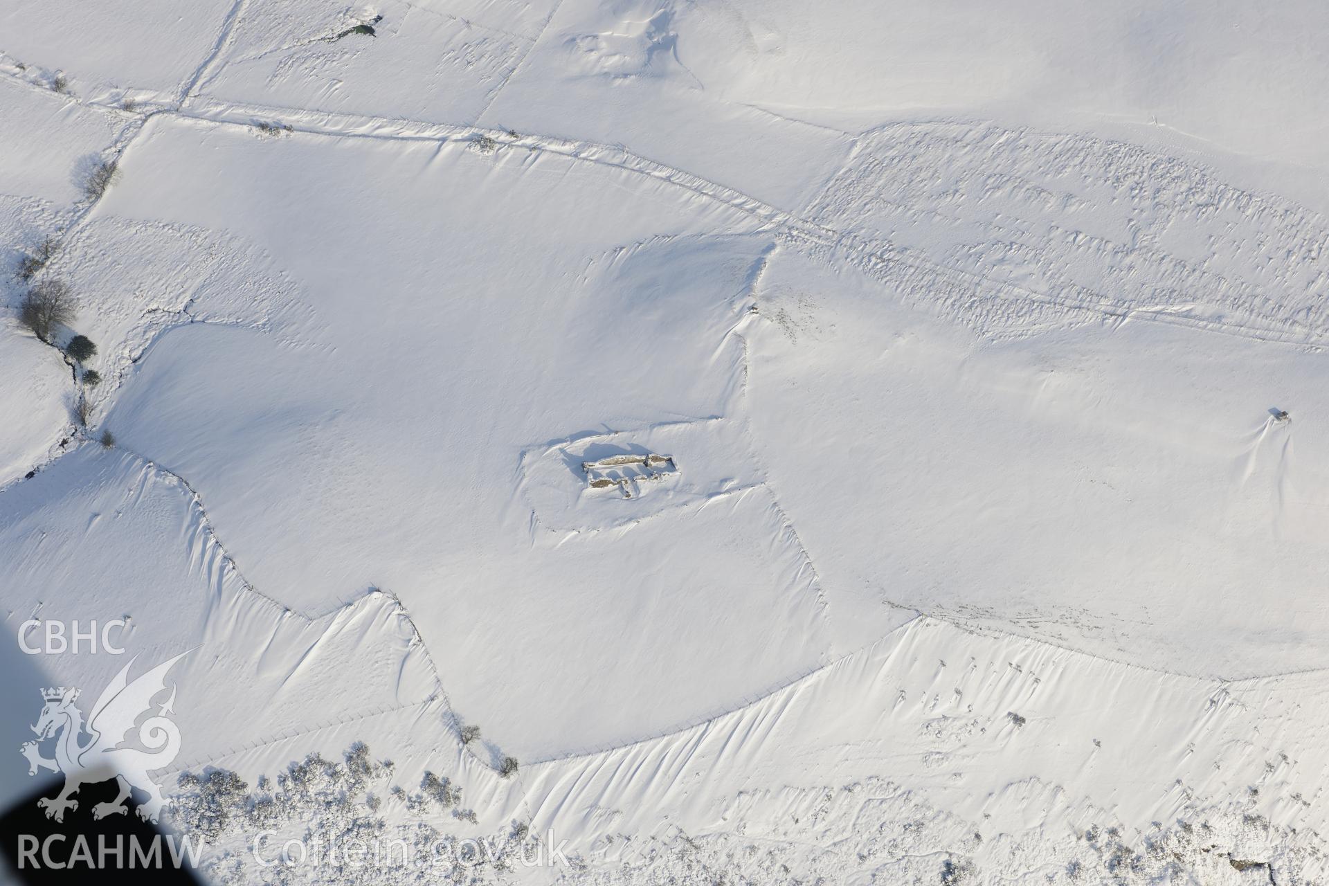 Remains of St. Peter's church, Llanbad, north of Llanharan, Bridgend. Oblique aerial photograph taken during the Royal Commission?s programme of archaeological aerial reconnaissance by Toby Driver on 24th January 2013.