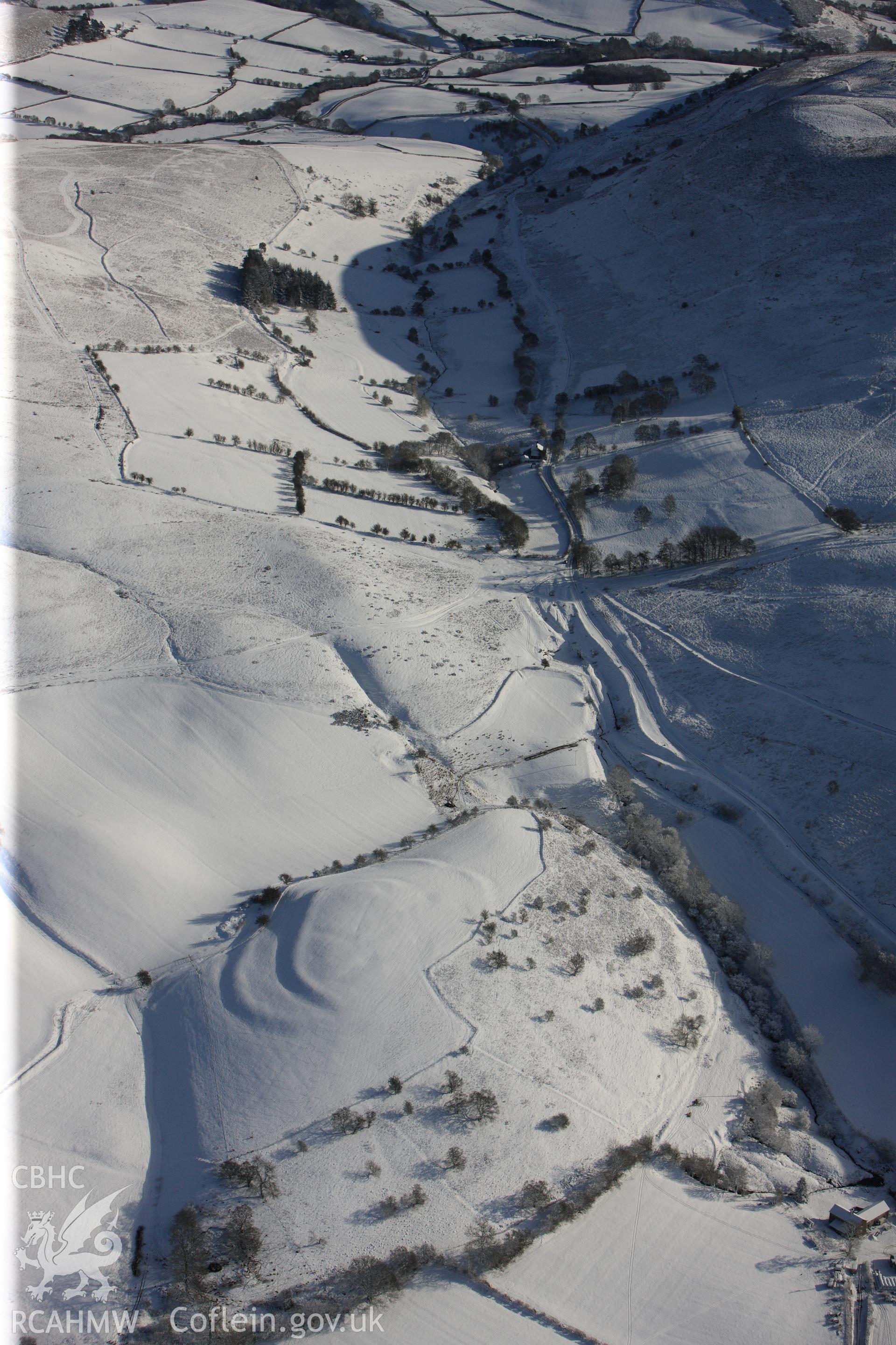 Wern Camp defended enclosure, Glascwm, north east of Builth Wells. Oblique aerial photograph taken during the Royal Commission?s programme of archaeological aerial reconnaissance by Toby Driver on 15th January 2013.