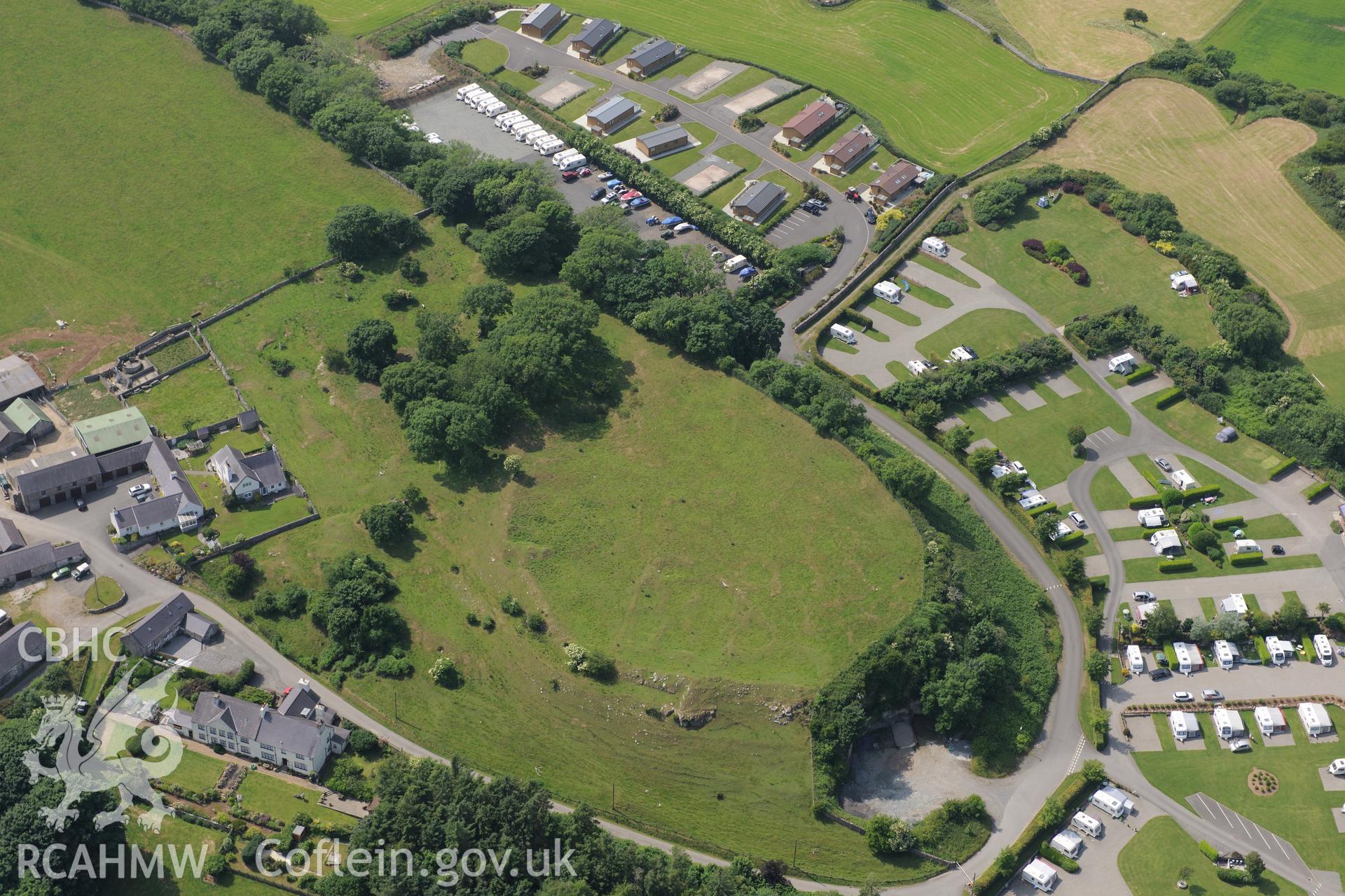 Parciau Hillfort - possible site of Roman building near Moelfre, Anglesey. Oblique aerial photograph taken during the Royal Commission?s programme of archaeological aerial reconnaissance by Toby Driver on 12th July 2013.