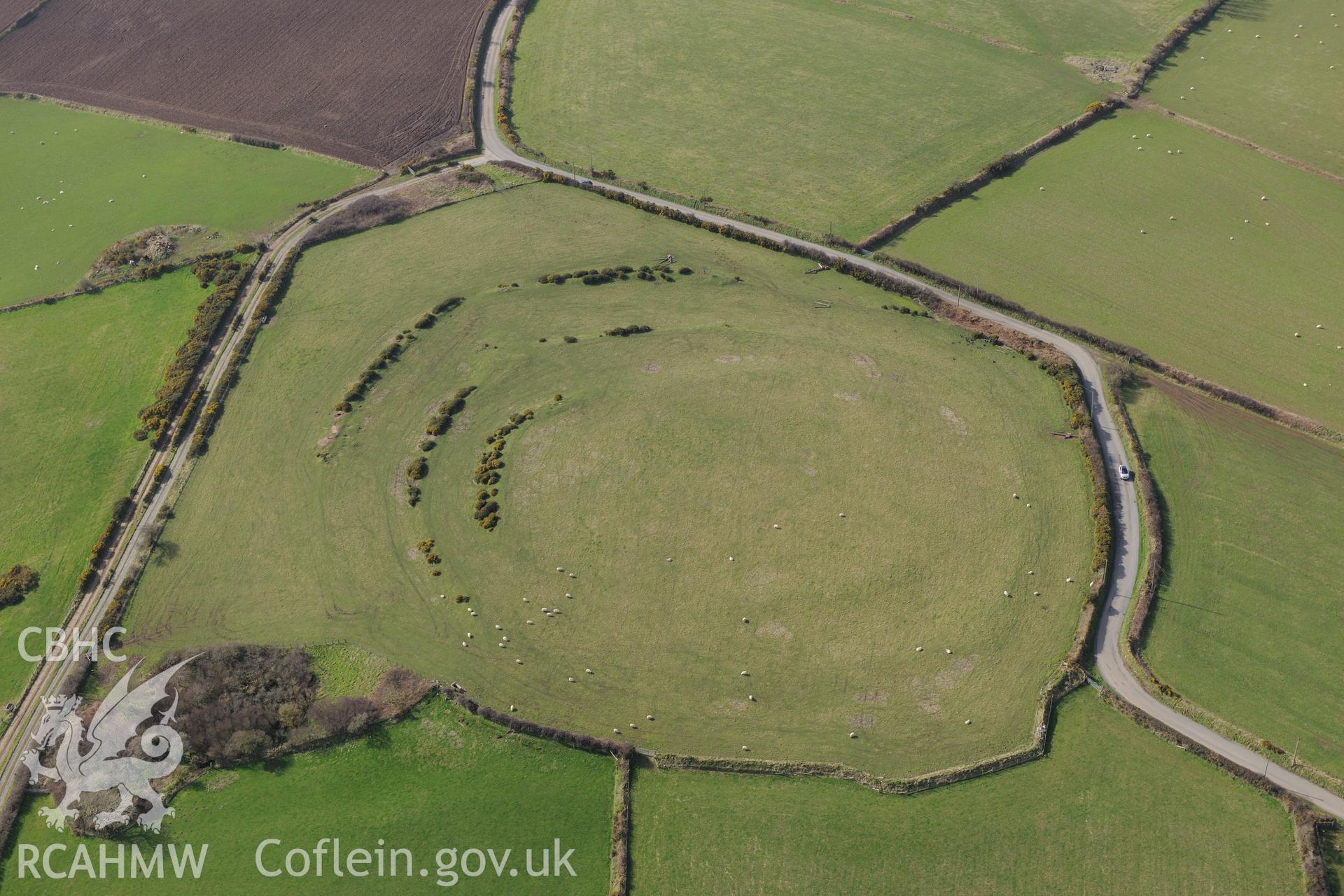 Caerau Gaer defended enclosure, Moylgrove, near Cardigan. Oblique aerial photograph taken during the Royal Commission's programme of archaeological aerial reconnaissance by Toby Driver on 13th March 2015.