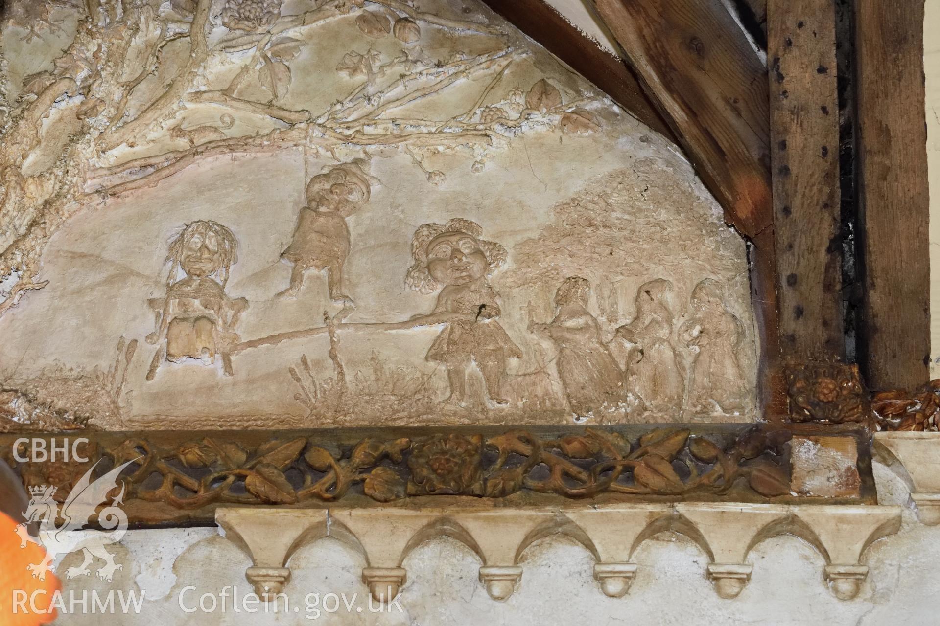 Colour photograph showing view looking north west at detail of bottom right section of plasterwork in gablet of lateral chimney at Y Sospan, Llys Owain, Dolgellau. Photographed by I. P. Brookes of Engineering Archaeological Services, June 2019.