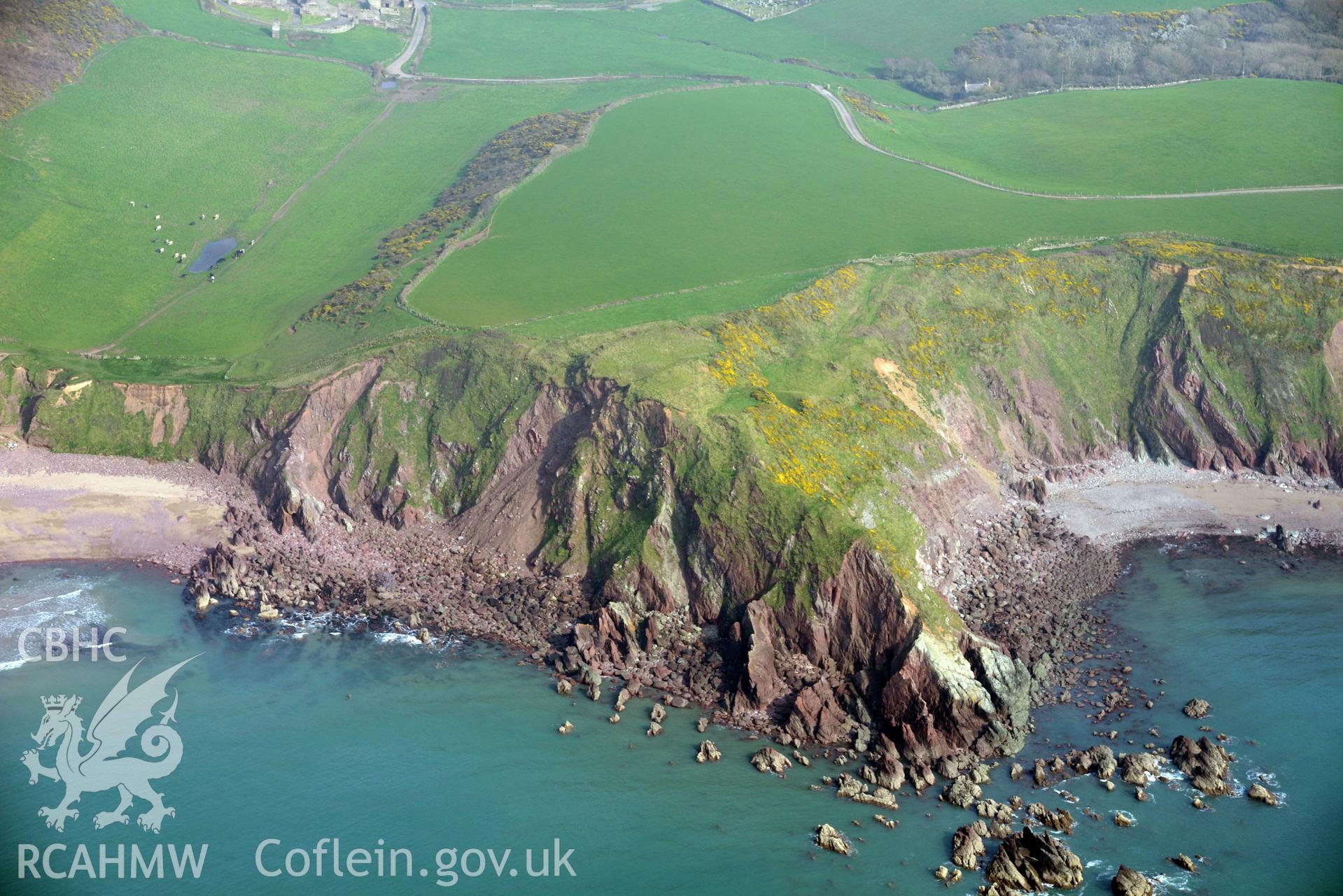 Aerial photography of Great Castle Head taken on 27th March 2017. Baseline aerial reconnaissance survey for the CHERISH Project. ? Crown: CHERISH PROJECT 2017. Produced with EU funds through the Ireland Wales Co-operation Programme 2014-2020. All material made freely available through the Open Government Licence.